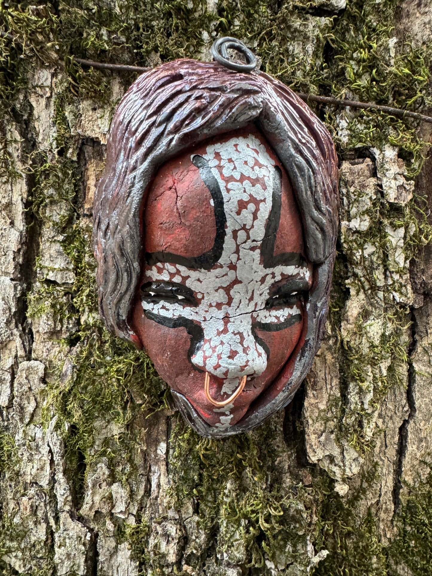 Bringing charm and vivacity, this mask will surely be a cherished adornment. Its tribal designs add pizzazz and make any room sparkle! It measures 4" x 3" x 2" and weighs approx. 6 ozs.