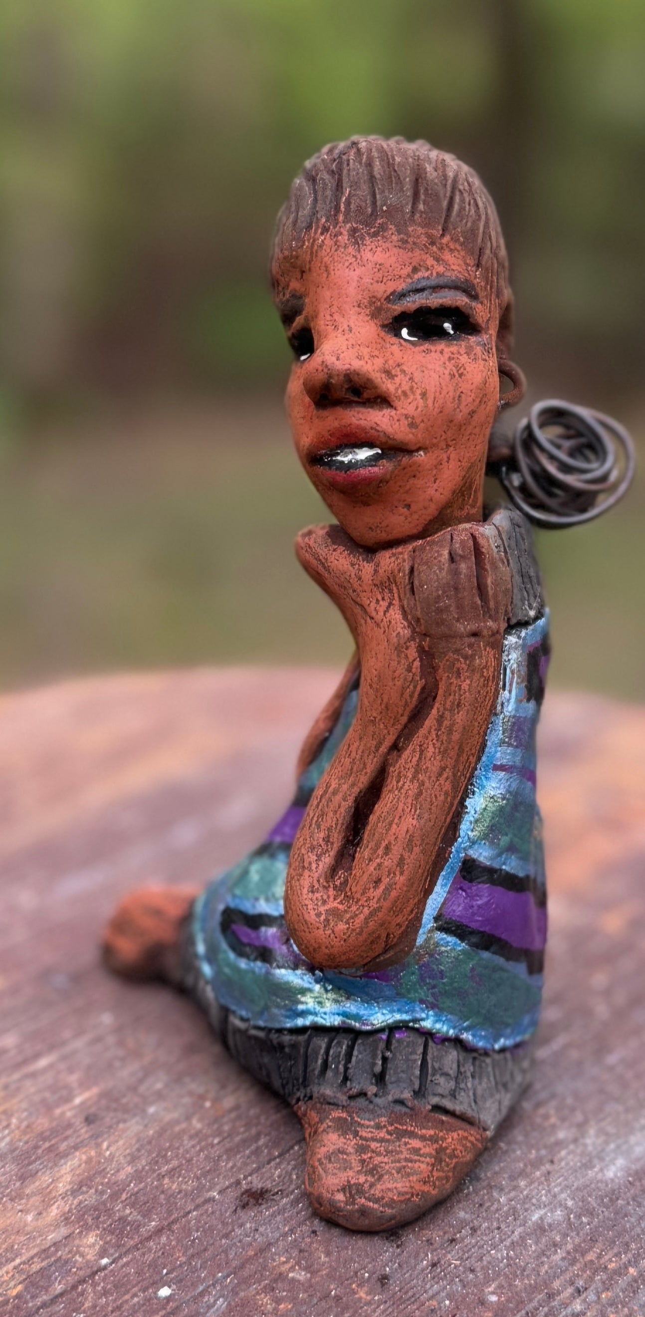 Say hello to Pam, the daring figurine standing at 6" x 4" x 3" and weighing a mere 10 ozs. Adorned in a striking striped dress and with her coiled hair as her crown, Pam exudes boldness and bravery as she sits in a yoga pose, radiating curiosity. Embark on an adventure with the Herdew Collection and feel the exhilaration of free shipping and our customer-friendly return policy. Don't let this unique piece slip away! <p> </p>