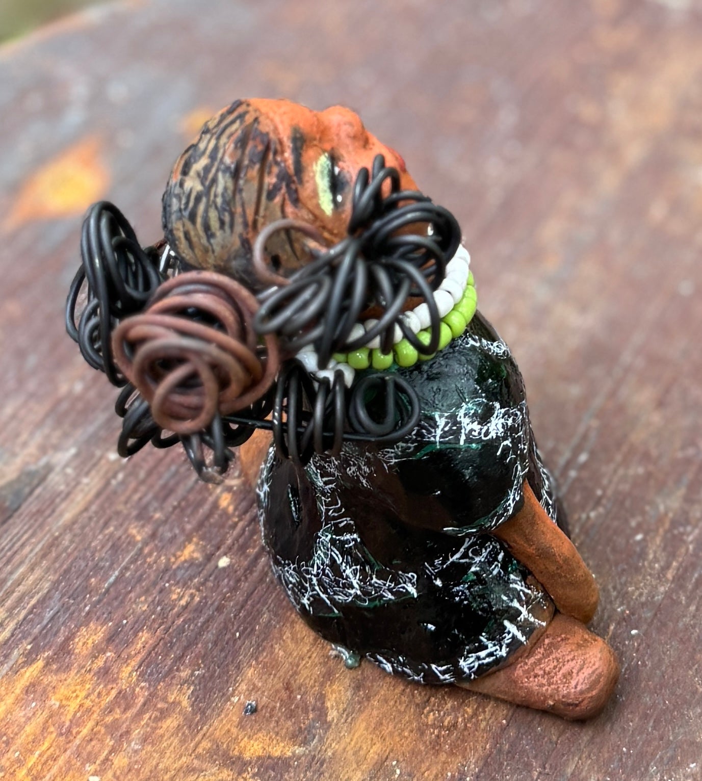 Say hello to Salana, the daring figurine standing at 4.5" x 3.5" x 3" and weighing a mere 8.5 ozs. Adorned in a striking black and white African print dress and with her coiled hair as her crown, Salana exudes boldness with her head held back and bravery as she sits in a yoga pose, radiating confidence. Embark on an adventure with the Herdew Collection and feel the exhilaration of free shipping and our customer-friendly return policy. Don't let this unique piece slip away!