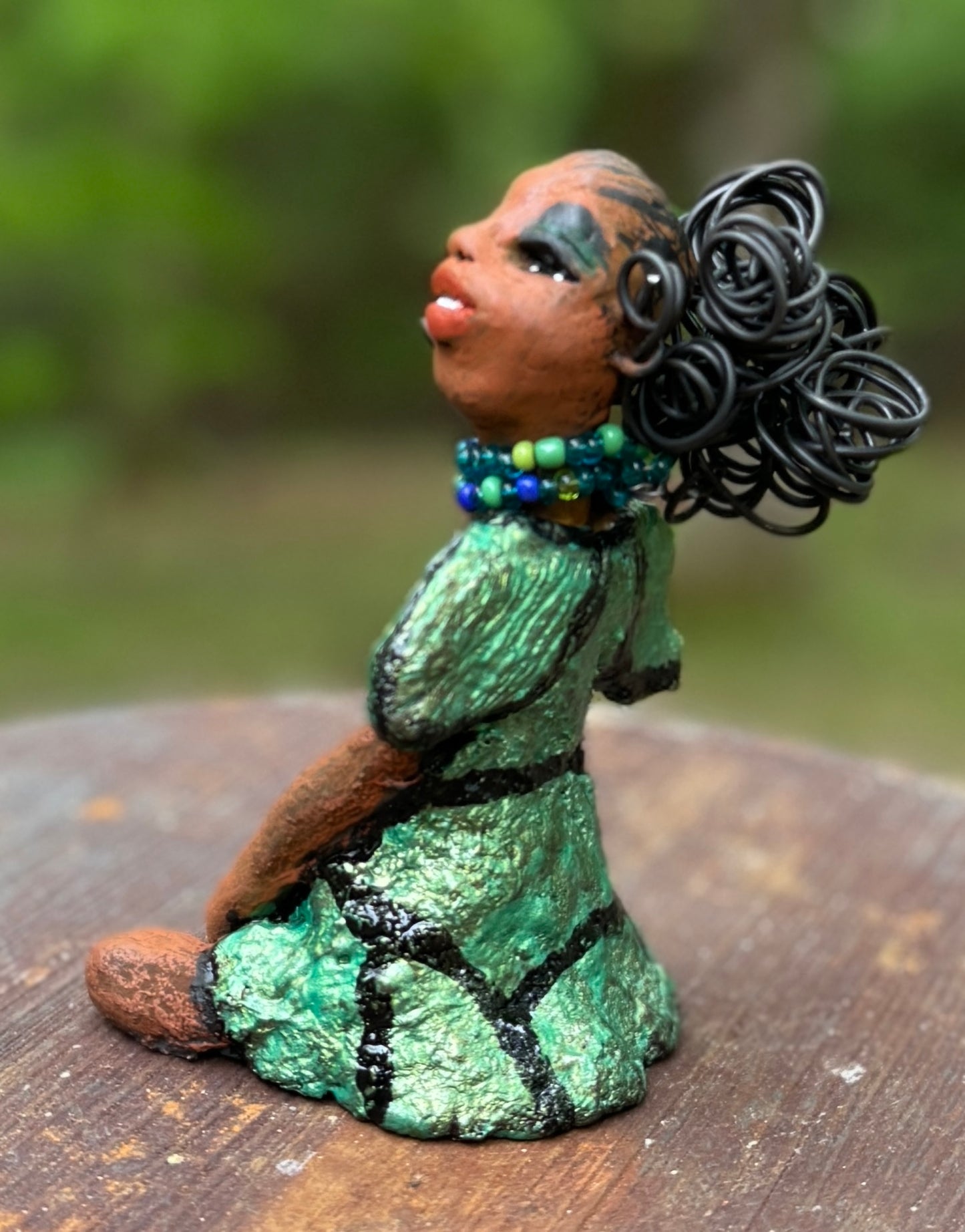 <p>Say hello to Sophia, the daring figurine standing at 5.5" x 4" x 3" and weighing a mere 10 ozs. Adorned in a striking striped dress and with her coiled hair as her crown, Sophia exudes boldness and bravery as she sits in a yoga pose, radiating curiosity. Embark on an adventure with the Herdew Collection and feel the exhilaration of free shipping and our customer-friendly return policy. Don't let this unique piece slip away!</p> <p> </p> <meta charset="UTF-8"> <h2 style="text-align: center;"></h2>