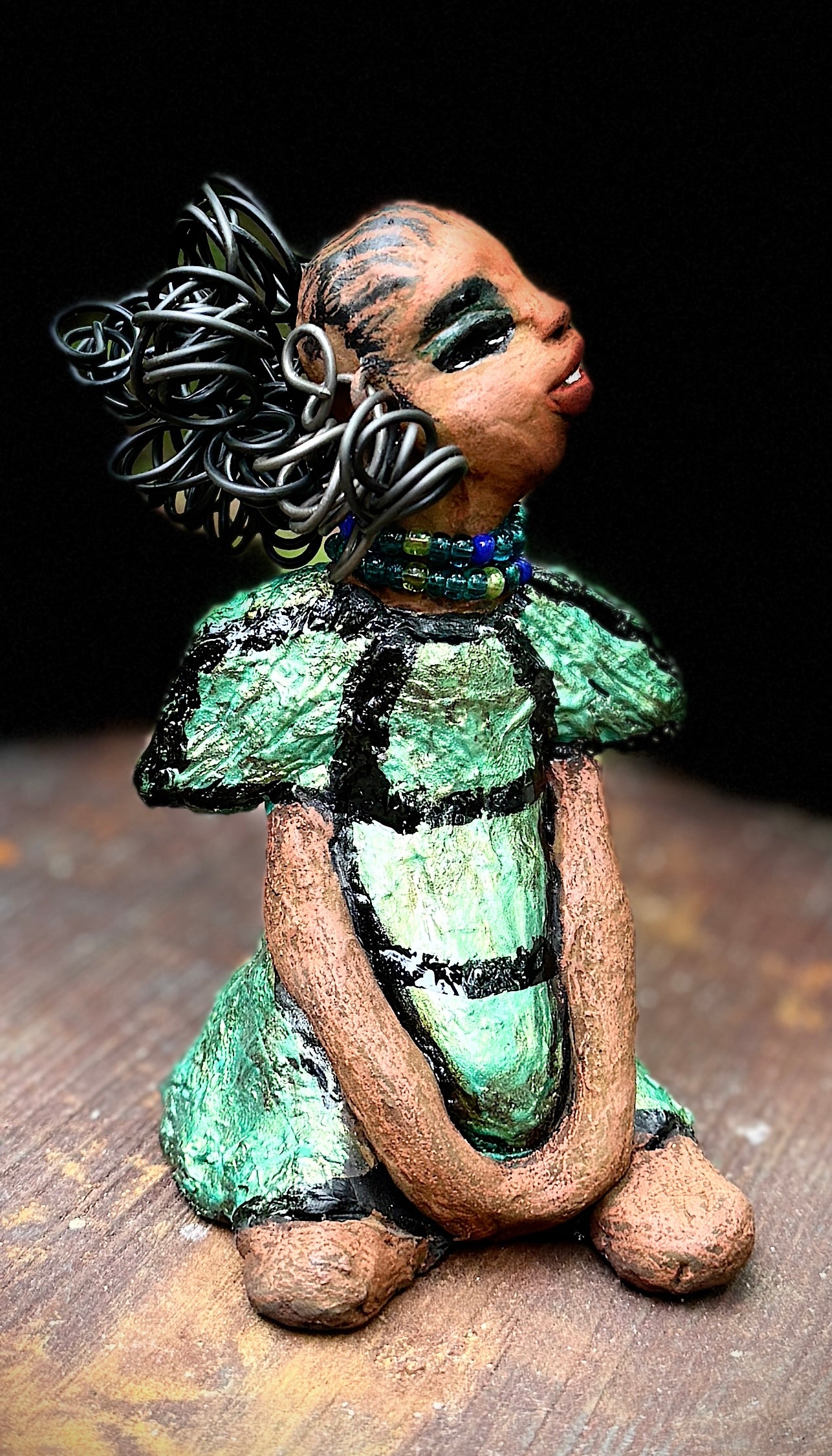 <p>Say hello to Sophia, the daring figurine standing at 5.5" x 4" x 3" and weighing a mere 10 ozs. Adorned in a striking striped dress and with her coiled hair as her crown, Sophia exudes boldness and bravery as she sits in a yoga pose, radiating curiosity. Embark on an adventure with the Herdew Collection and feel the exhilaration of free shipping and our customer-friendly return policy. Don't let this unique piece slip away!</p> <p> </p> <meta charset="UTF-8"> <h2 style="text-align: center;"></h2>