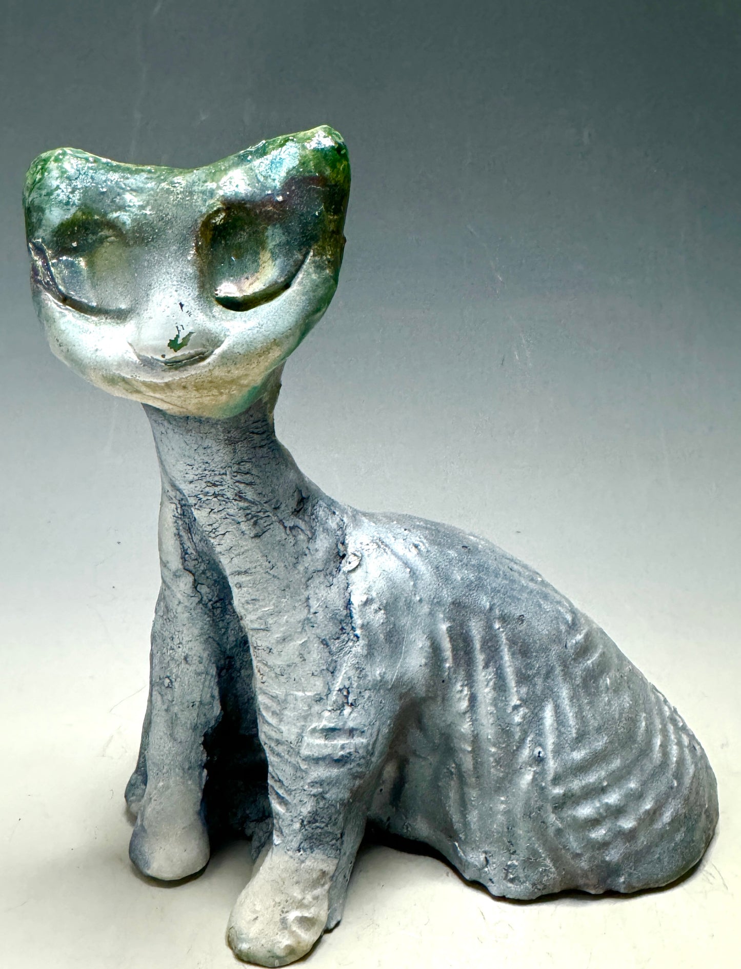 Welcome HK-8: 6.5' x 4" x 6" of endearing embrace! Gift your special someone with a marvelous mouser mate, light in weight at only 1.5 lbs, comely-colored in sky blue fur. Surround your abode with joy as she shines a dazzling grin. Prepare to be elated by this remarkable feline friend!