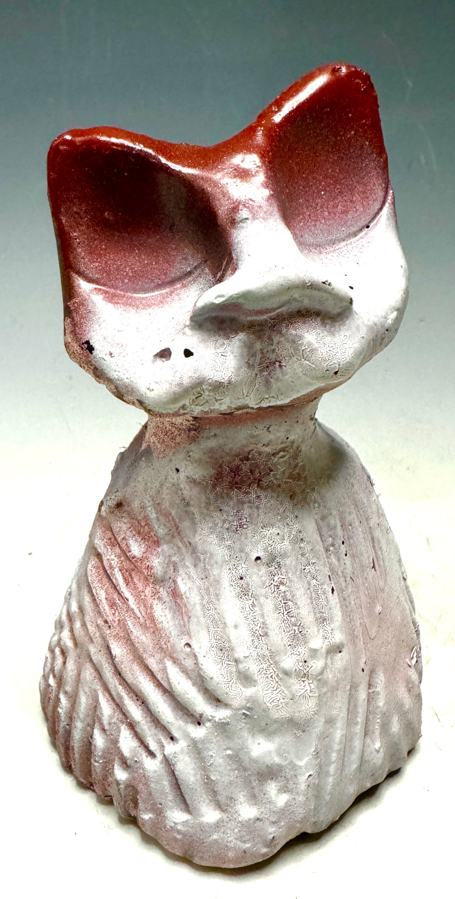 Say hello to Hello Kitty-3, the grumpy kitty! At 5' x 5" and 4", she's compact and light enough for any space. Her peaceful red hue sparkles with joy, and her 5 oz. weight brings a smile to your face. Embrace the world's wonderfulness with HK-3, a purr-fectly grumpy companion!
