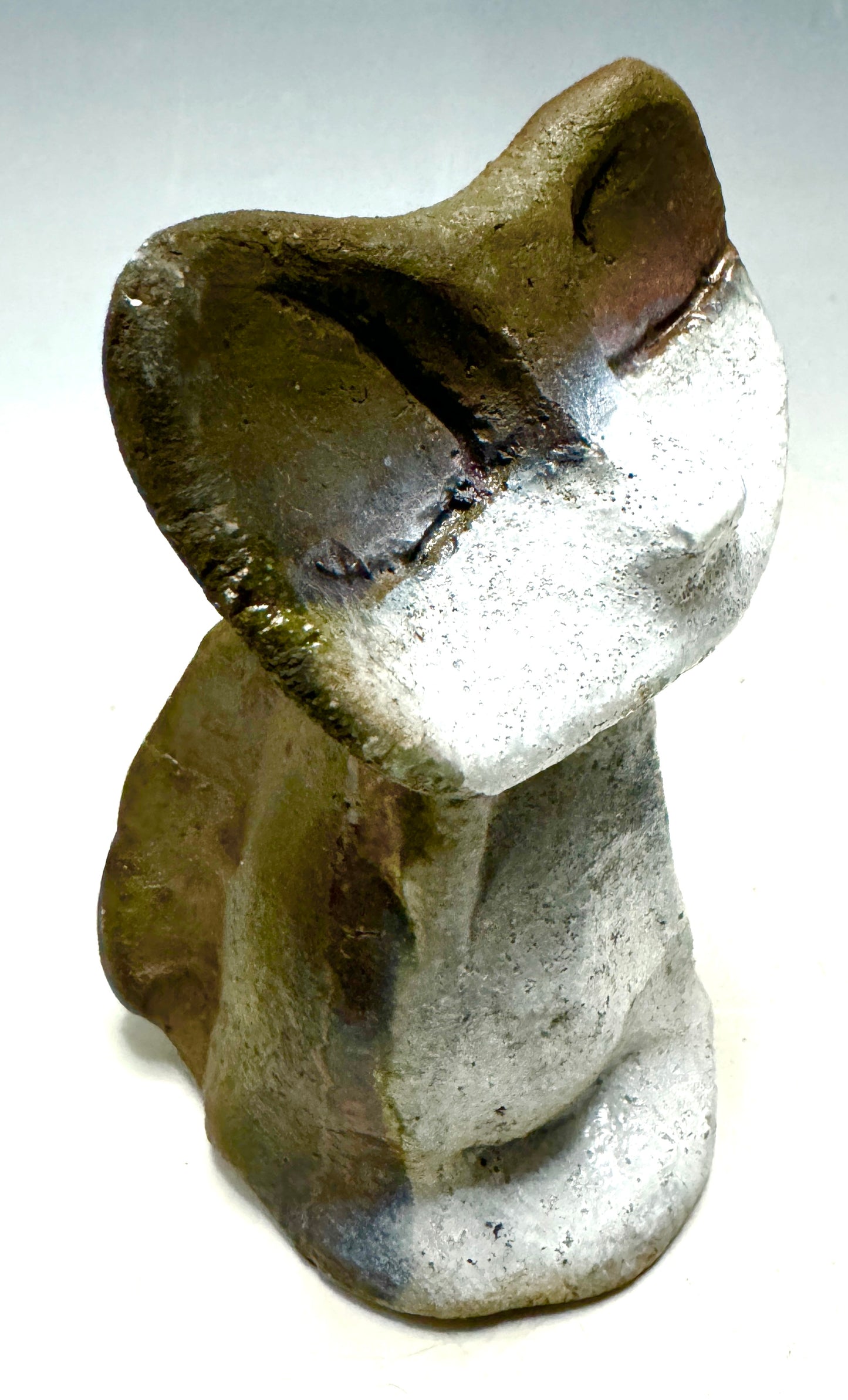 Welcome HK-3, the most adorably purr-fect feline friend about! At only 4' x 2" x 2", she's totally lightweight and ready to make any room happier. Her happy gray color shimmering and her 5 oz. mass sure to bring a smile to your face. Invite bliss into your home with this delightful kitty-cat cutie!