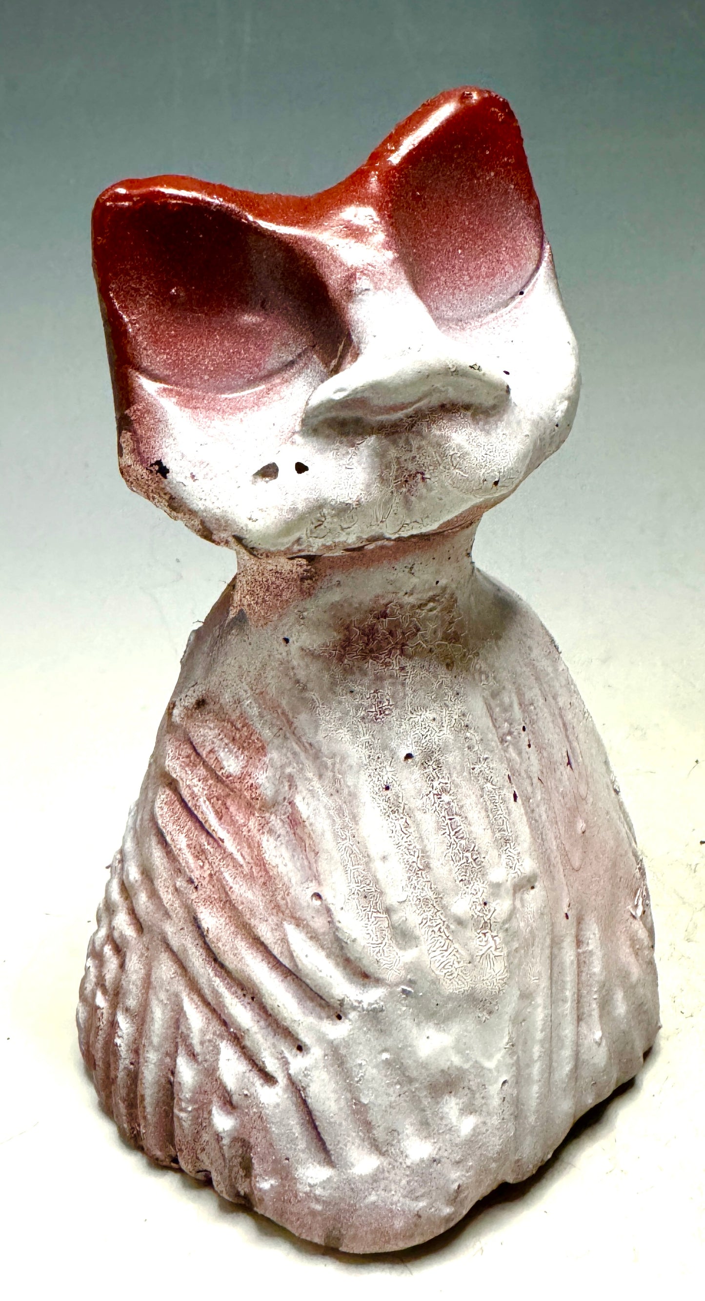 Say hello to Hello Kitty-3, the grumpy kitty! At 5' x 5" and 4", she's compact and light enough for any space. Her peaceful red hue sparkles with joy, and her 5 oz. weight brings a smile to your face. Embrace the world's wonderfulness with HK-3, a purr-fectly grumpy companion!