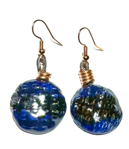 Raku Fired Earrings Shimmery Copper Luster Glazed on both sides 1/2 ounce The Raku Fired Earrings have a unique copper luster glaze that adds a special touch to any outfit. They come in a convenient 1/2 ounce pack, so you can easily take them on the go.