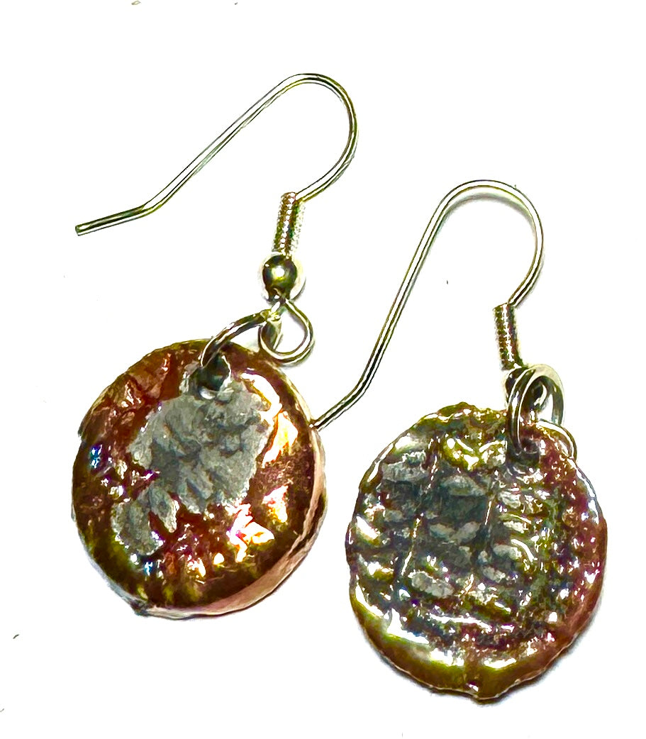 Raku Fired Earrings Shimmery Copper Luster Glazed on both sides 1/2 ounce The Raku Fired Earrings have a unique copper luster glaze that adds a special touch to any outfit. They come in a convenient 1/2 ounce pack, so you can easily take them on the go.