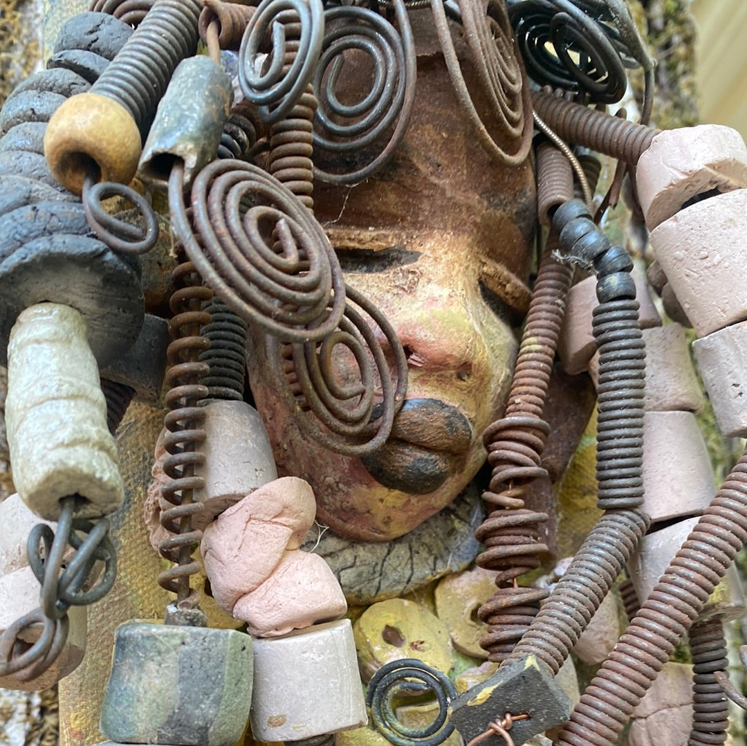 Dee is mounted on a 4"x 6" painted canvas. I spent about 2 hours or more just fixing Dee's hair and attaching beads! Dee has over 30 feet of 16 gauge wire for hair and over 16 raku and 30 acrylic & wooden beads. Dee has an awesome two tone pink copper crackle face and rustic brown lips. Dee is ready to be hung! Got Questions???? This ready-to-hang wall art adds an eye-catching, one-of-a-kind display to your home or office. Every detail and texture of Dee adds to the beauty and uniqueness of the artwork