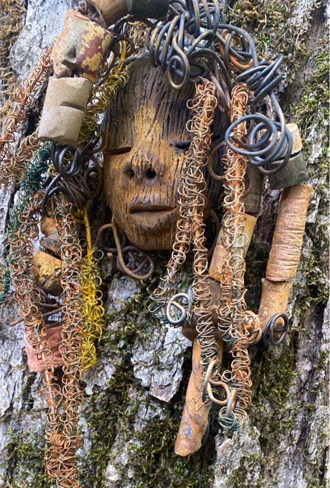 Vetti is 6”x8 ” and weighs 4.6 ozs. She has a two tone copper brown complexion. Vetti has big hair with several spiral coils handmade Raku beads. Over 30 ft of hand twisted 16 and 24 gauge wire!