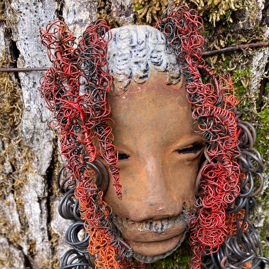 Yao is 5”x 8 ” and weighs 7ozs. He has an amazing brown complexion. Yao has big hair with several spiral coils handmade Raku beads. Over 80 ft of hand twisted 16 and 24 gauge wire!