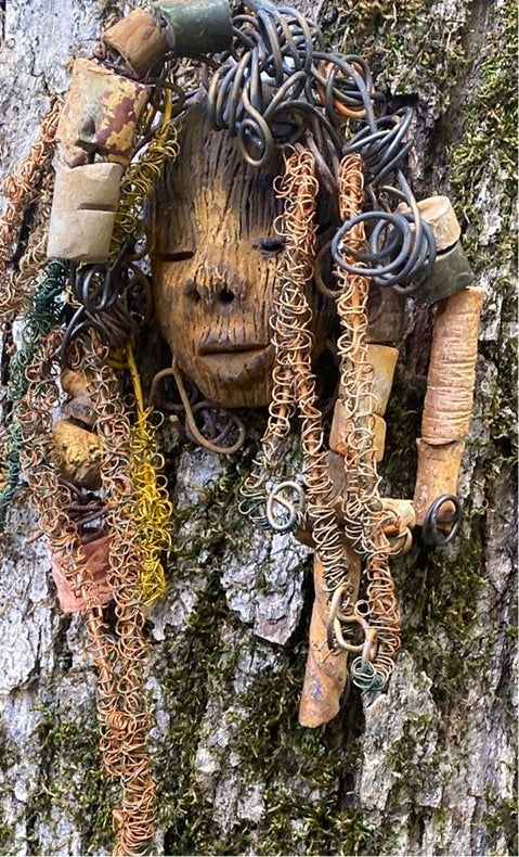 Vetti is 6”x8 ” and weighs 4.6 ozs. She has a two tone copper brown complexion. Vetti has big hair with several spiral coils handmade Raku beads. Over 30 ft of hand twisted 16 and 24 gauge wire!