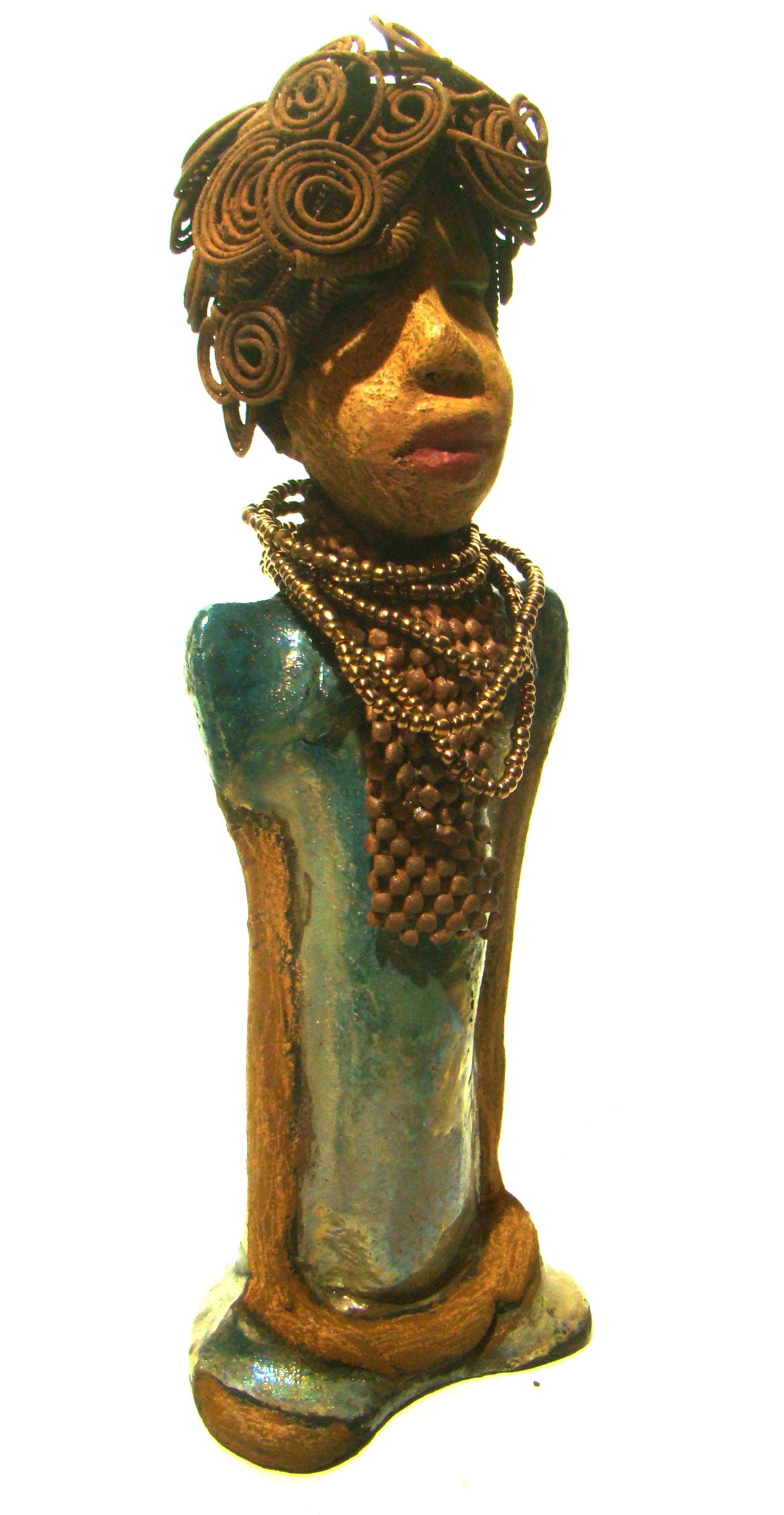 Sherri stands 13' x 4" x 2.5" and weighs 3.05 lbs.     She has over 25 feet of wire curls and coils.     Sherri has a sweet honey brown complexion.     Her dress is a metallic multi colored green with an amber beaded necklace and scarf.     Sherri has the familiar long loving arms at her side.