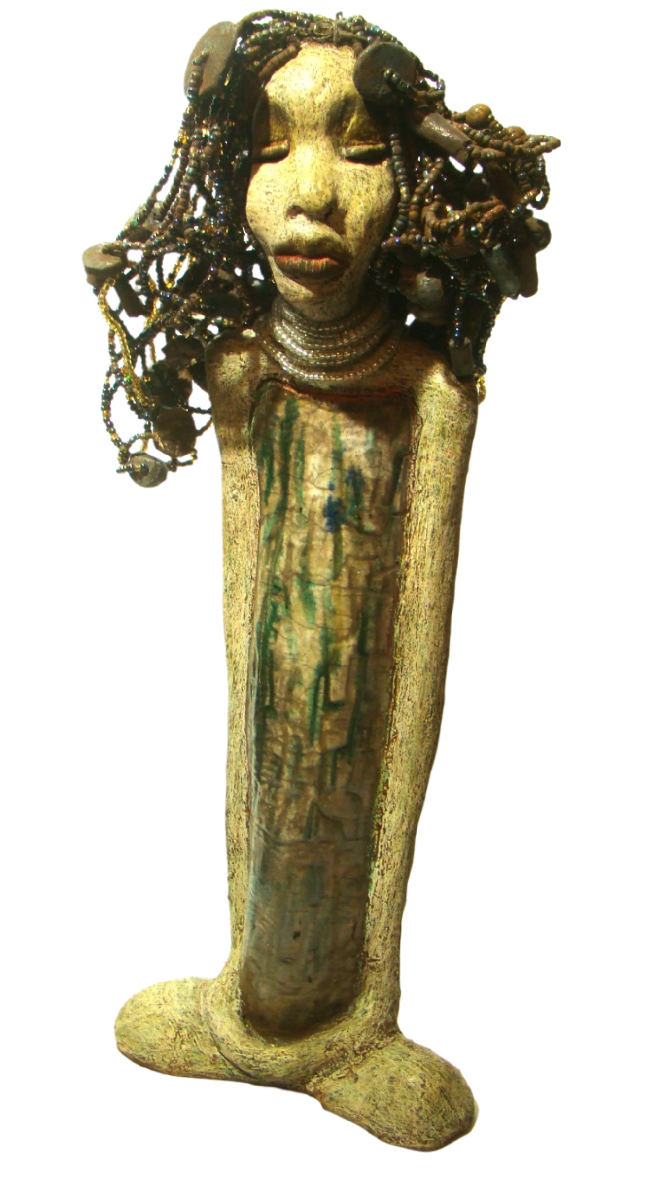 Meet Ariel, a meticulously crafted beauty. Standing at 21" x 9" x 4.5" and weighing 7lbs, she boasts a stunning beige and honey brown complexion. Her head is adorned with a variety of seed, pony, and raku beaded hair, adding to her allure. Adorned in a metallic alligator green dress with hints of shimmering copper, Ariel commands attention with her exotic gaze.