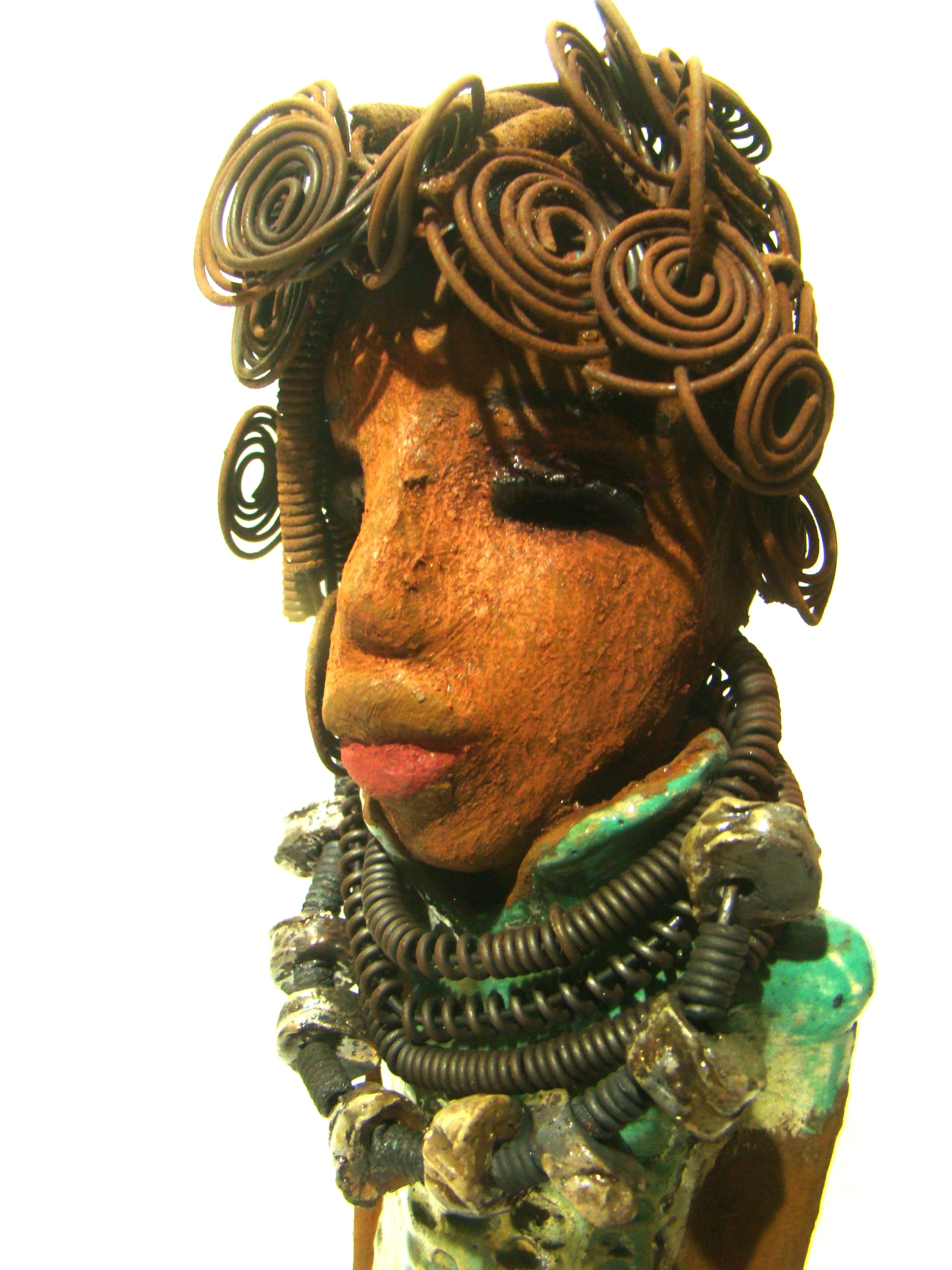 Martina stands 13" x 5" x 4" and weighs 3.15 lb. She wears a large beaded coiled collared necklace. Martina wears a metallic green gold textured dress. Martina has an awesome honey brown complexion that compliments her subdued look. She has those familiar long loving arms! Martina is looking for a new home. She is a conversation piece. Free Shipping!