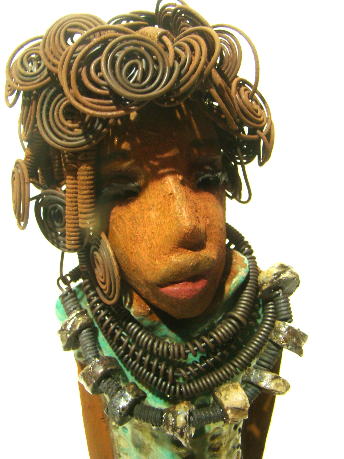 Martina stands 13" x 5" x 4" and weighs 3.15 lb. She wears a large beaded coiled collared necklace. Martina wears a metallic green gold textured dress. Martina has an awesome honey brown complexion that compliments her subdued look. She has those familiar long loving arms! Martina is looking for a new home. She is a conversation piece. Free Shipping!