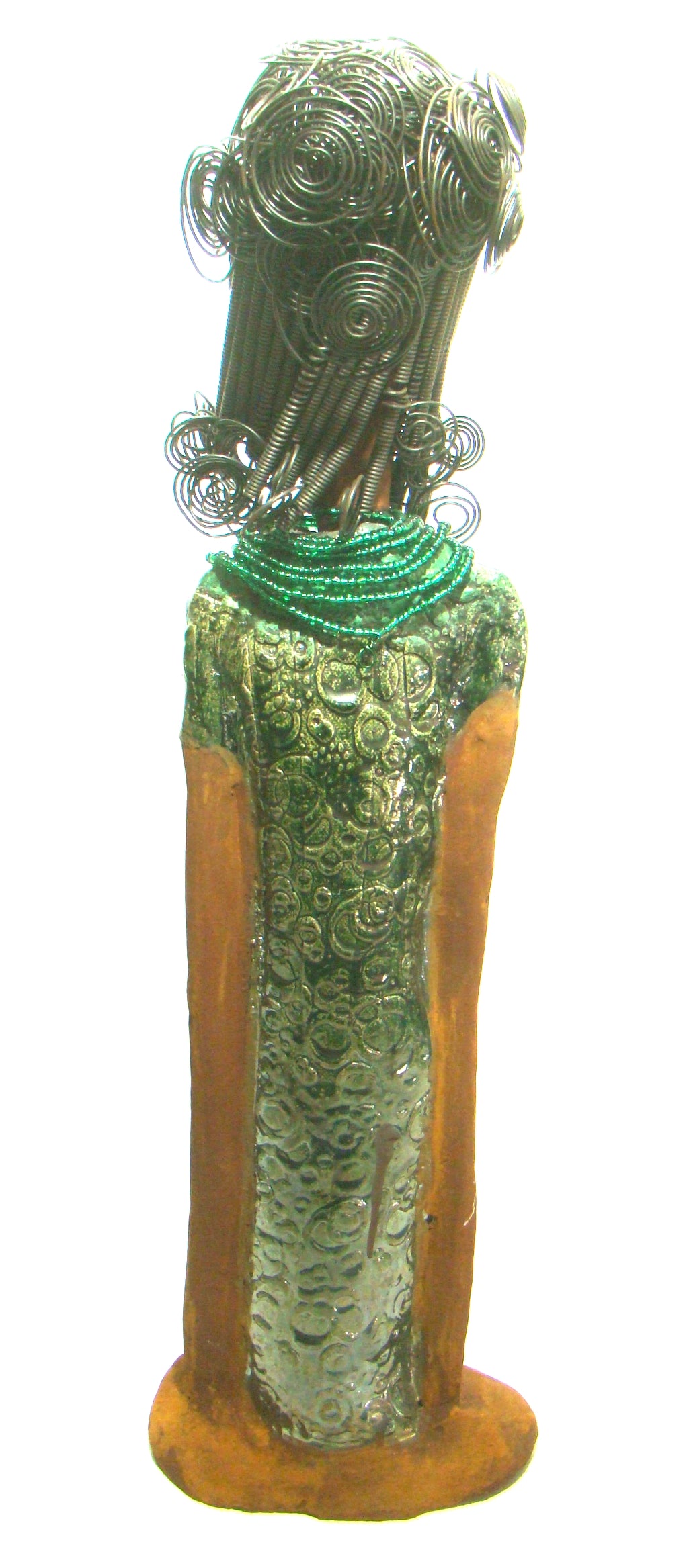 Felicia stands 25" x 8" x 6". and weighs 8.14 Lbs. She has a honey brown complexion with with over 40 feet of fancy wire hair. Felicia dress is textured alligator green. She wears emerald green bead. She really does have a sweet face.