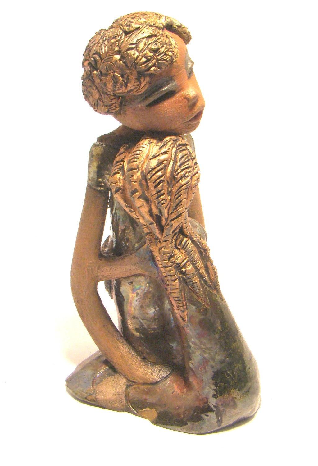 Hold Me Mama depicts the bond between a mother and child. They stand 10" x 5" x 5" and weighs 2.8 lbs. Mother and Child has honey brown complexions with etched...