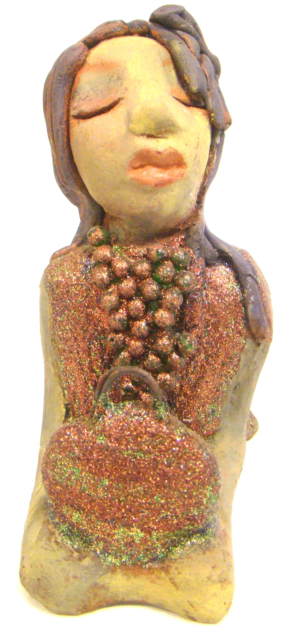 Lacey stands 6" x 3" x 7.5" and weighs 1.08 lbs. She has a lovely beige olive green complexions with ruby red lips. Her hair is made of coiled clay. Lacey is holding her handbag which matches her copper glittered dress. Give Lacey a special place in your home.