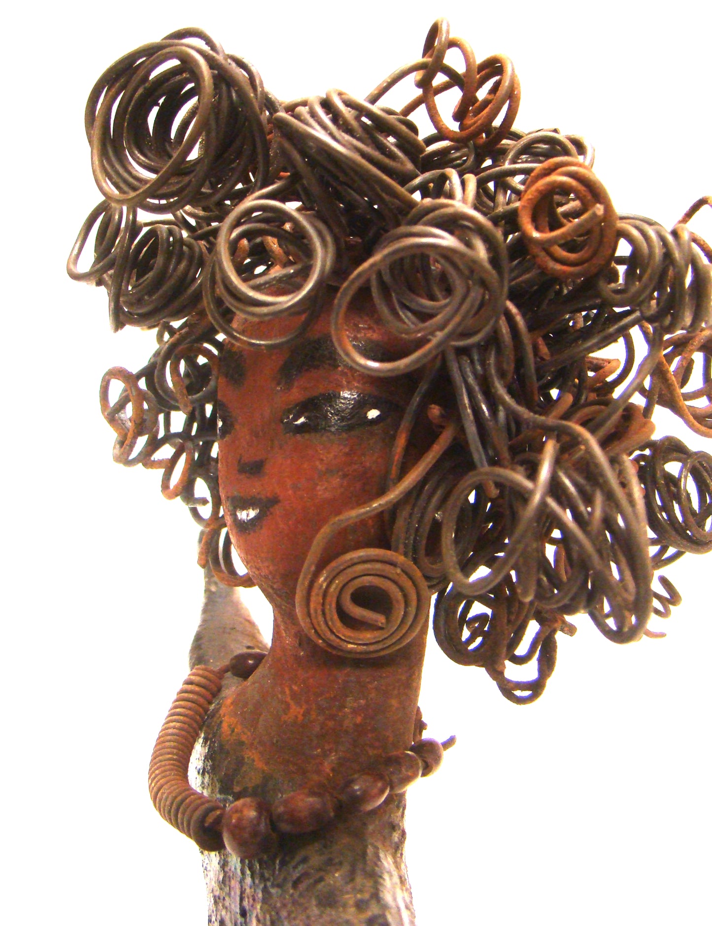 Harold stands 6" x 5" x 3" and weighs 8 ozs. He has a cocoa brown complexion with dreamy eyes. His hair is smokey gray and made of clay. Harold wears an extra large copper sweat shirt with a black collar. Harold is a great starter piece in the men Herdew collection.