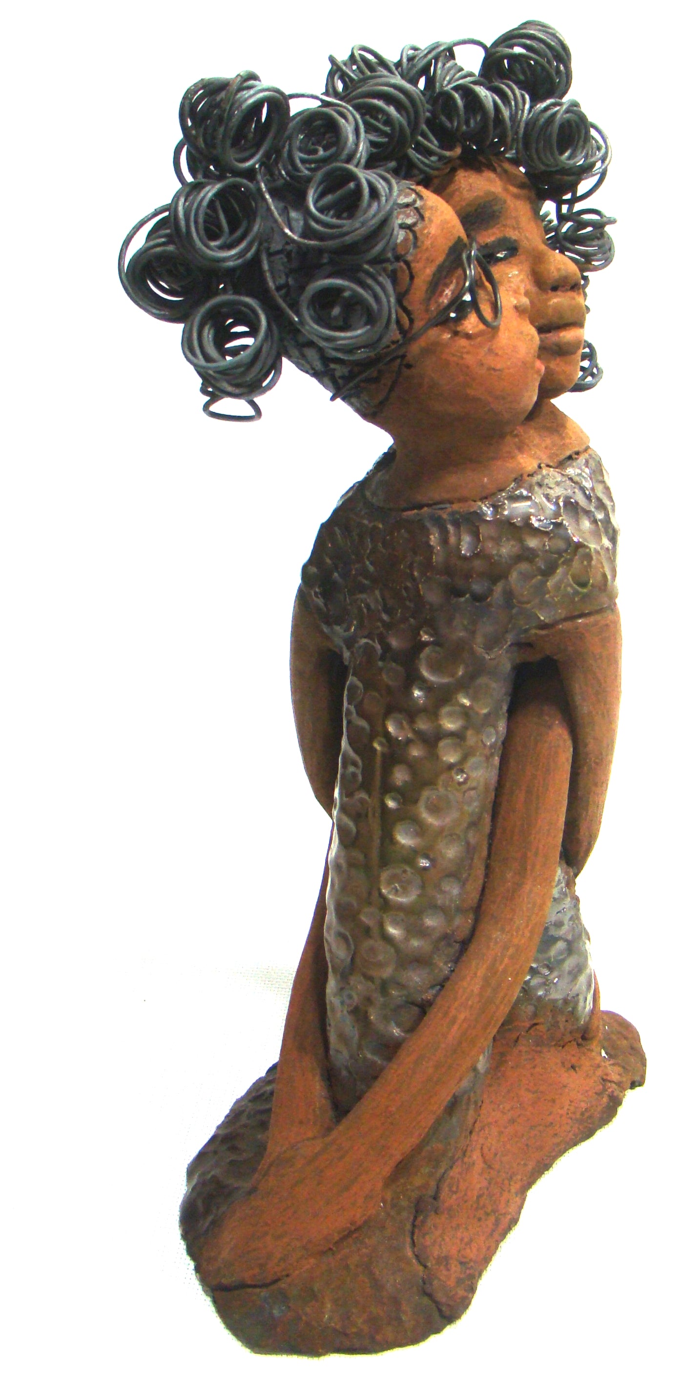 My BFF stands 13" x 8" x 4" and weighs 4.13 lbs.     Both girls have lovely honey brown complexions.     Their dresses are textured and have copper metallic glazes.     The long loving arms of My BFF embrace one another with love.     My BFF has over 25 feet of curly 16 gauge wire hair.     My BFF represents the close bond and friendship that has developed between all women of every race, ethnicity, and color.     My BFF will make an excellent gift to your BFF!     Free Shipping!