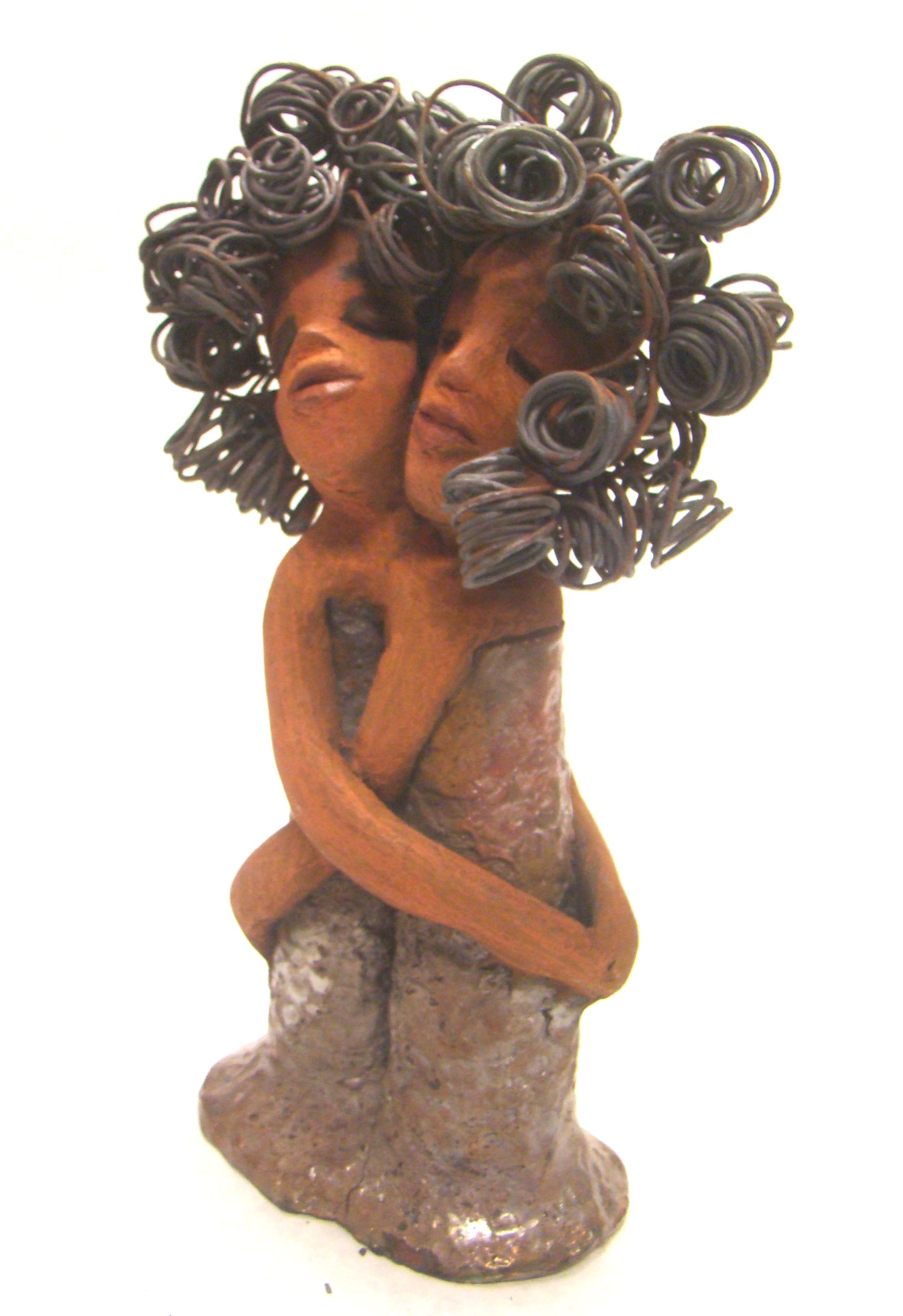 Sister Love stands 11" x 5" x 3" and weighs 2.06 lbs. Combined they have over 45 feet of curled 16 gauge wire hair. The dresses are textured with an antique copper glaze. They have lovely honey brown complexions. Sister Love is inseparable! Give them a special place in your home. Free Shipping!