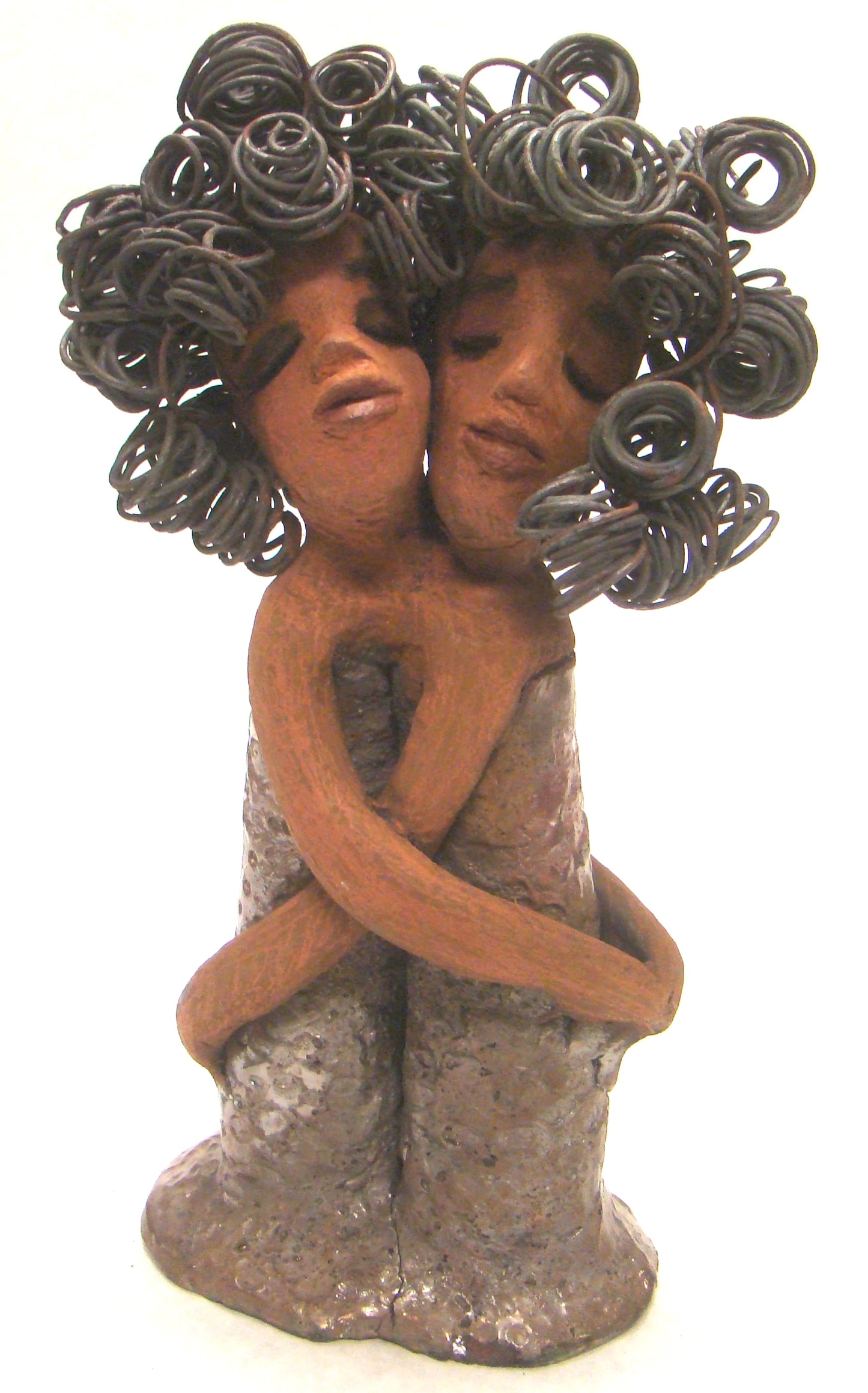 Sister Love stands 11" x 5" x 3" and weighs 2.06 lbs. Combined they have over 45 feet of curled 16 gauge wire hair. The dresses are textured with an antique copper glaze. They have lovely honey brown complexions. Sister Love is inseparable! Give them a special place in your home. Free Shipping!