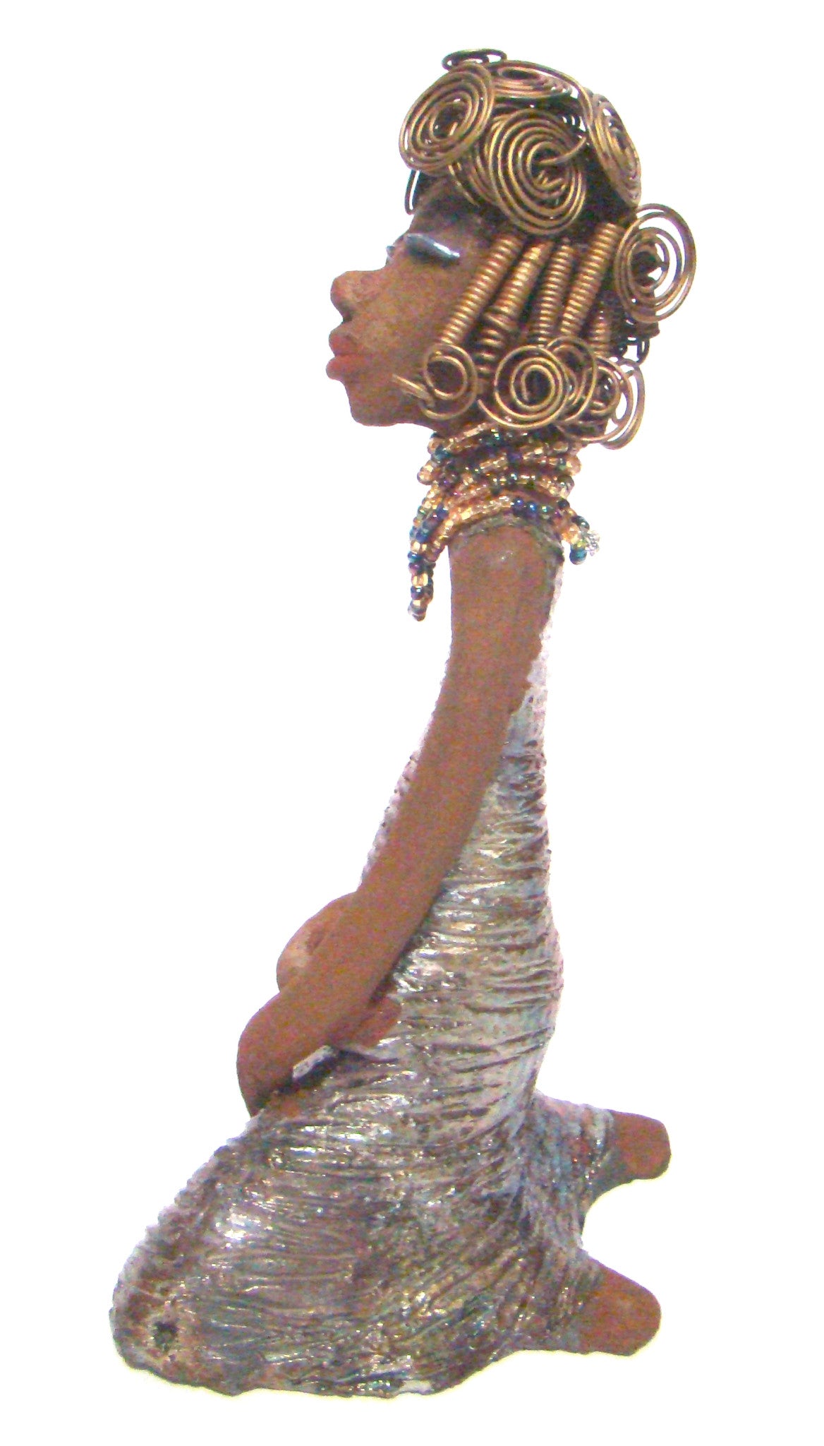 Gloria is a raku fired and stands 12" x 7" x 5" and weighs 2.1lbs. She has a lovely brown complexion. Gloria's hair is gold and black. It took over 3 hours and 40 feet of coils and spiral 16 guage wire to complete.