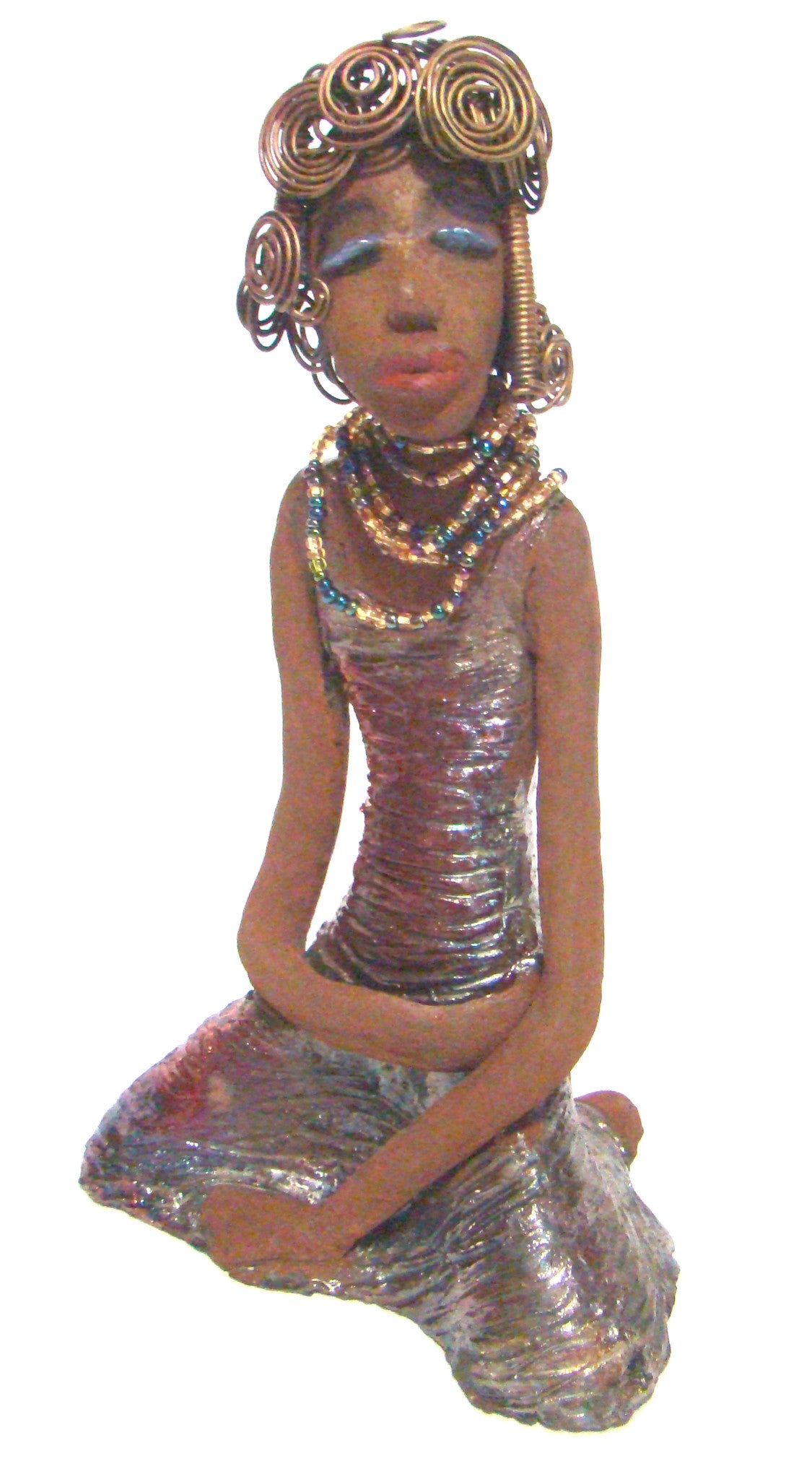 Gloria  is a raku fired and stands 12" x 7" x 5" and weighs 2.1lbs. She has a lovely brown complexion. Gloria's hair is gold and black. It took over 3 hours and 40 feet of coils and spiral 16 guage wire to complete.