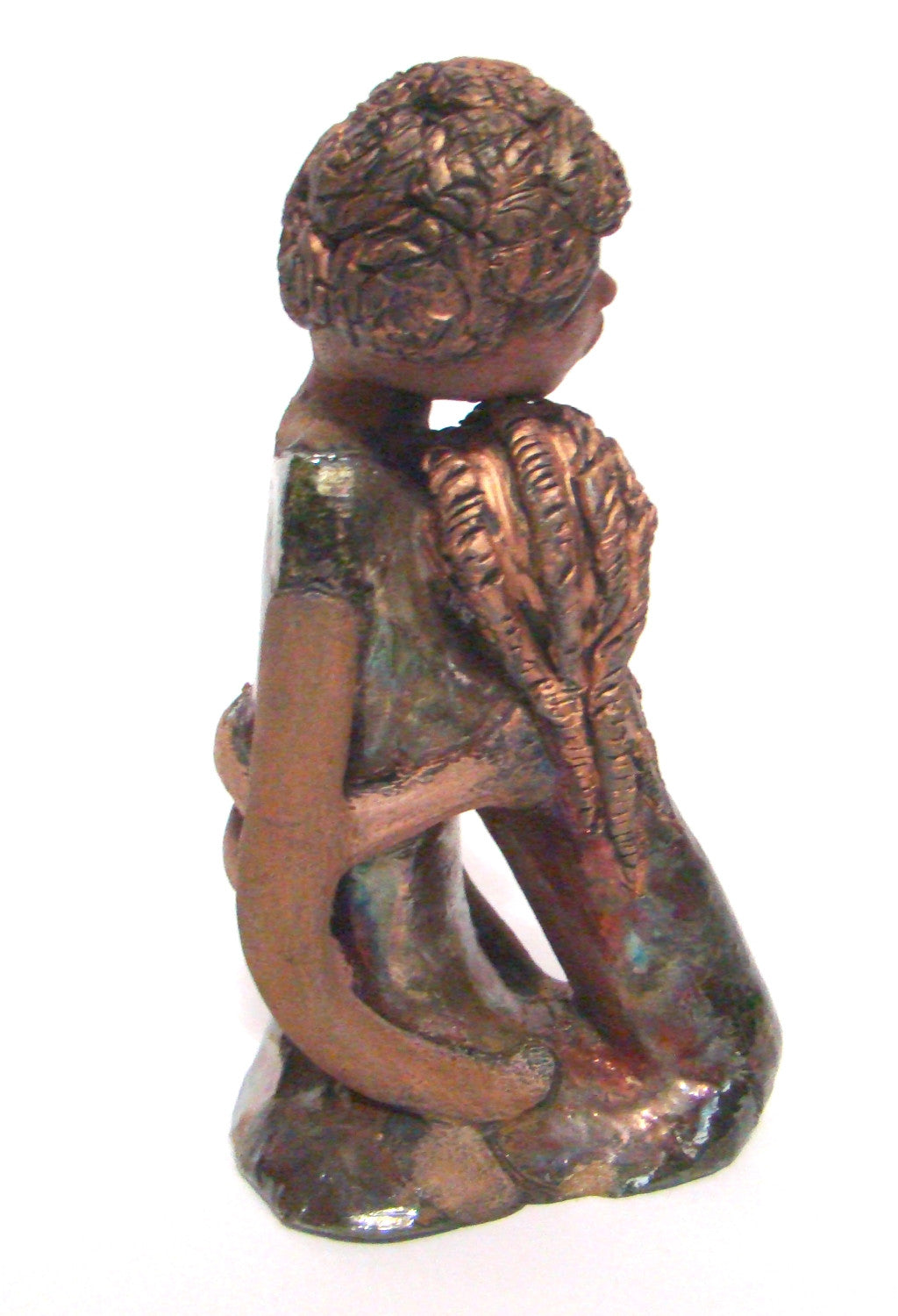 Hold Me Mama depicts the bond between a mother and child. They stand 10" x 5" x 5" and weighs 2.8 lbs. Mother and Child has honey brown complexions with etched...