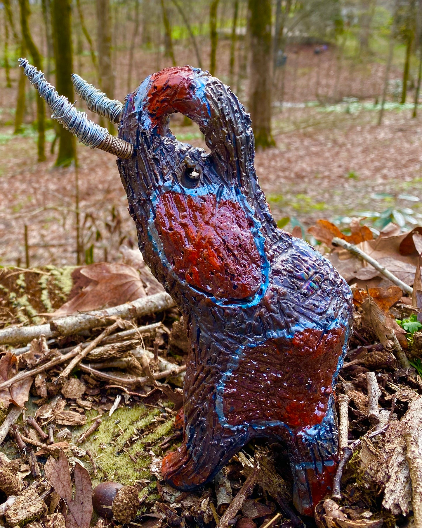 Have you HERD!!!!!! Just one of these lovely Raku Fired Elephant will make an excellent gift for your friend, sorority or for your home’ special place centerpiece. 9.5" x 4" x 7" 1.10 lbs Silver wire beaded tusk Beautiful metallic copper and orange raku colors For decorative purposely only.