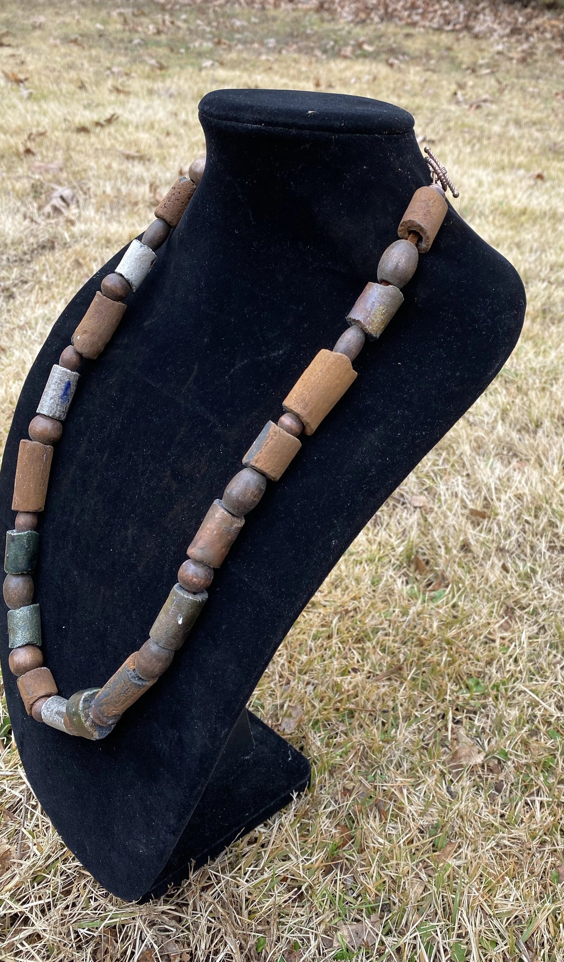 Nice Beaded Necklace 17 raku beaded necklace with 18 wooden beads. Weighs 4.5 ounces. Hangs 15"  Nice Did I say Light Weight!