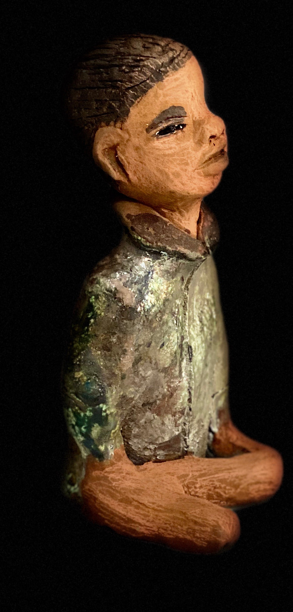 Ray is one confident teen who is ready to make his mark!  Ray stands 7"x 3" x 3" and weighs 14 ozs. He has a green metallic jacket with a high collar . Ray complexion is honey brown. His arms are folded as he ponders which college scholarship to accept!!
