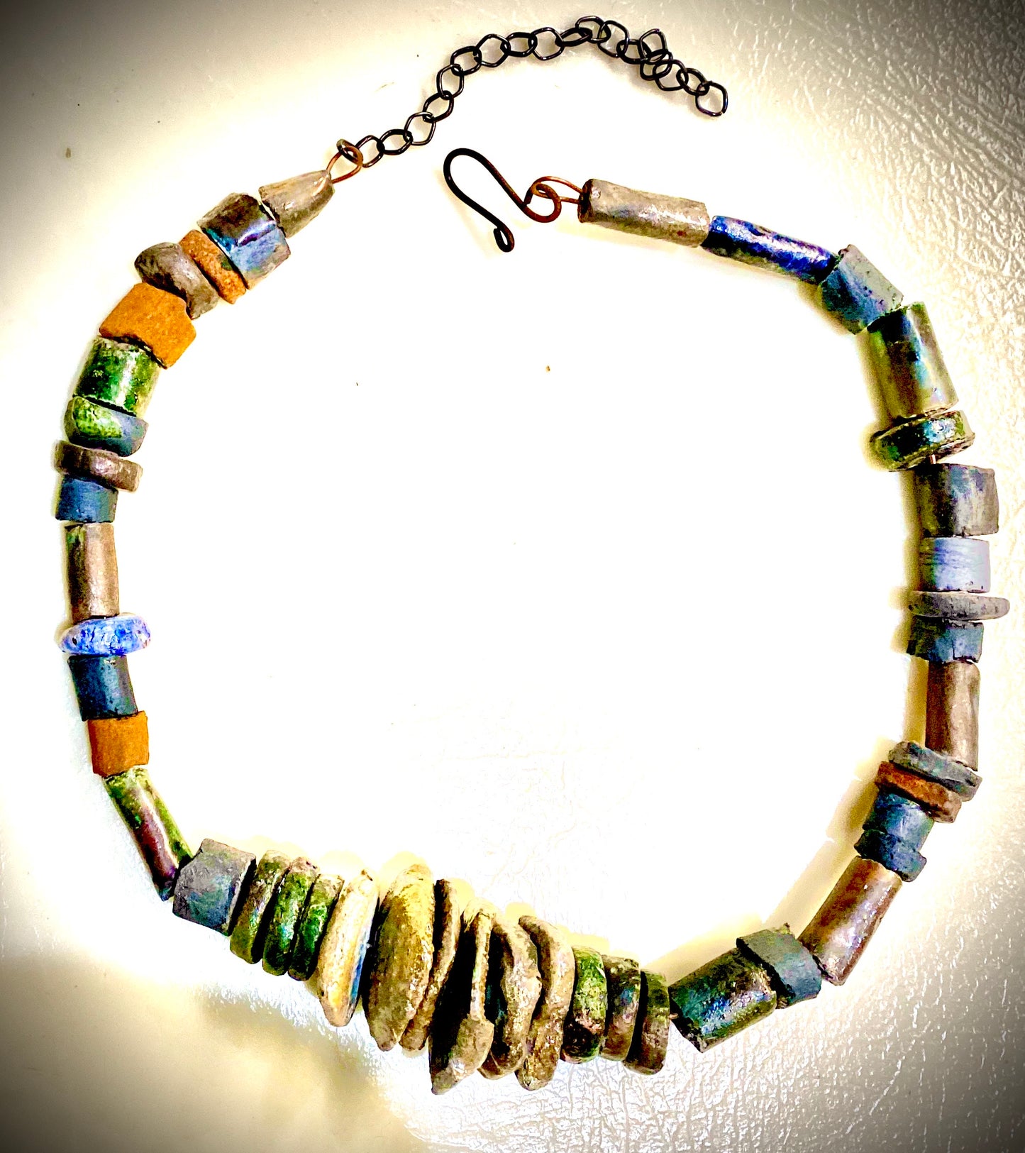 Simple and Beautiful! 42 raku beads. 10" haang black suede cord Amazingly Lightweight! 5.5 ozs!!