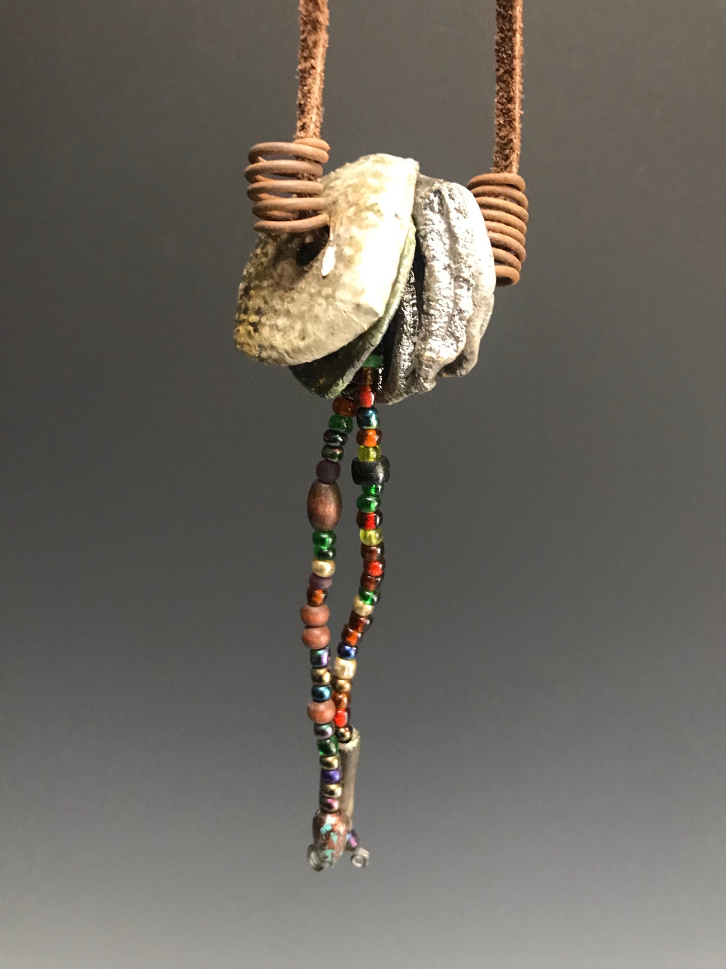 Simple and Beautiful! 14" cord 4 Raku fired discs small acrylic beads 1.6 ozs Nice!