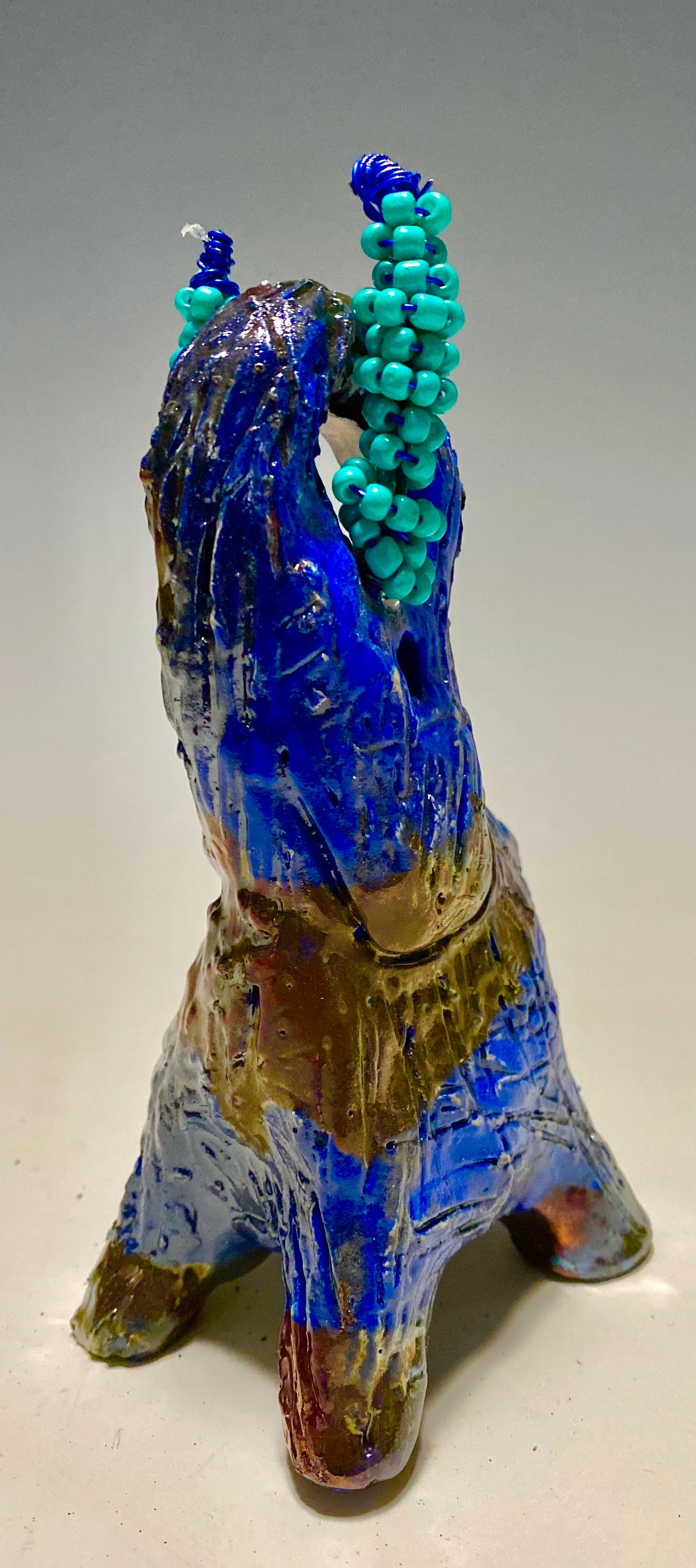 Raku Elephant Have you HERD!!!!!! Just one of these lovely Raku Fired Elephant will make an excellent gift for your friend, sorority or for your home’ special place centerpiece. Beautiful copper blue rust raku elephant. 3.5" x 3" x 3" 12 ozs Beaded tribal tusk. For decorative purposely only