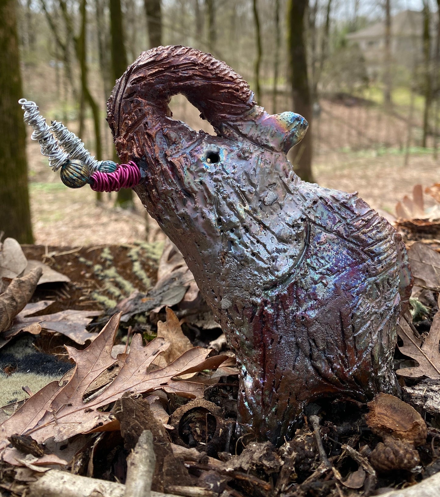 Have you HERD!!!!!! Elephants are one of my favorite animals to create. They are so majestic" Just one of these lovely Raku Fired Elephant will make an excellent gift for your BFF, or just for you . This raku fired elephant stands 6" x 4" x 6" and weighs 1 lb. She has beaded tusks and a textured glossy gold and copper metallic body. This one is nice to add your Herdew Collection!