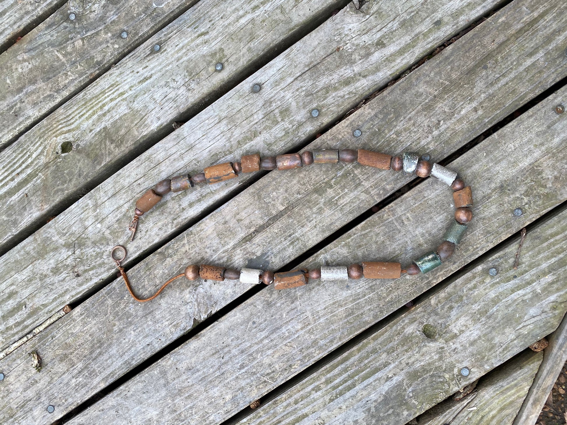 Nice Beaded Necklace 17 raku beaded necklace with 18 wooden beads. Weighs 4.5 ounces. Hangs 15"  Nice Did I say Light Weight!
