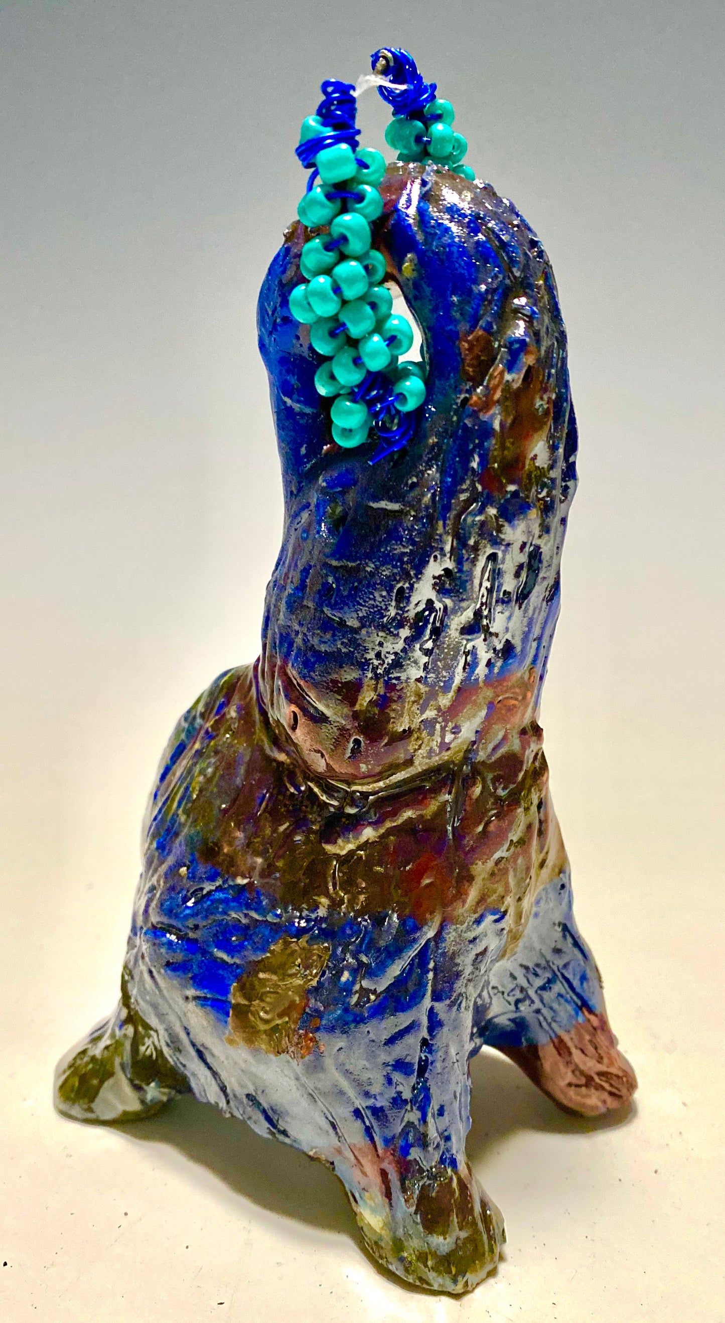 Raku Elephant Have you HERD!!!!!! Just one of these lovely Raku Fired Elephant will make an excellent gift for your friend, sorority or for your home’ special place centerpiece. Beautiful copper blue rust raku elephant. 3.5" x 3" x 3" 12 ozs Beaded tribal tusk. For decorative purposely only