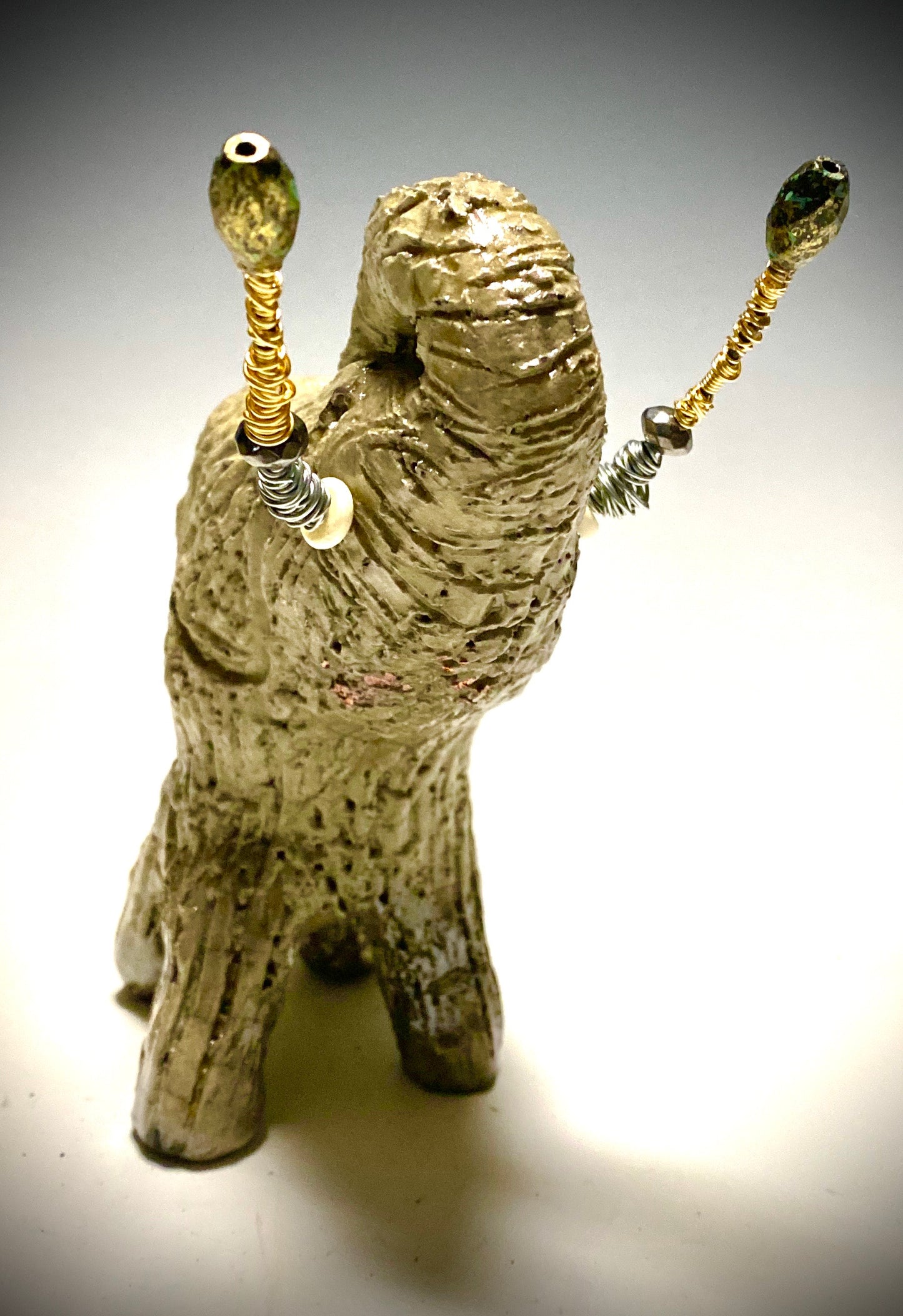 Raku Elephant Have you HERD!!!!!! Just one of these lovely Raku Fired Elephant will make an excellent gift for your friend, sorority or for your home’ special place centerpiece. 6" x 3" x 4" 1.3 lbs Beautiful metallic white raku elephant For decorative purposely only