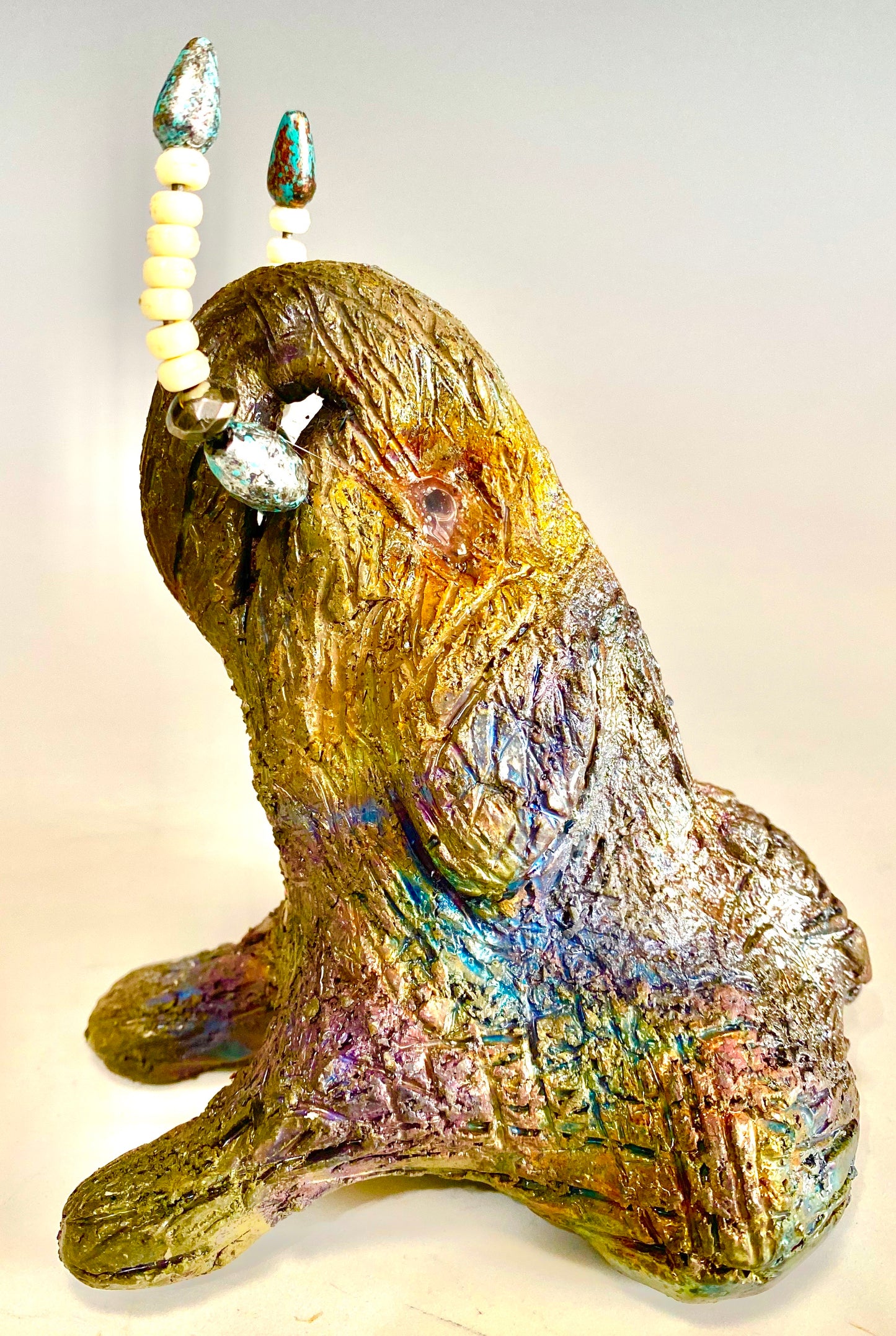 Have you HERD!!!!!! Elephants are one of my favorite animals to create. They are so majestic" Just one of these lovely Raku Fired Elephant will make an excellent gift for your BFF, or just for you . This raku fired elephant sits 5" x 2" x 2.5" and weighs 10 ounces. She has beaded tusks and a textured copper metallic body. Great for gift. Nice!