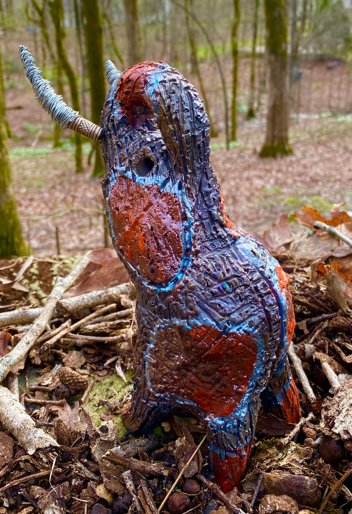 Have you HERD!!!!!! Just one of these lovely Raku Fired Elephant will make an excellent gift for your friend, sorority or for your home’ special place centerpiece. 9.5" x 4" x 7" 1.10 lbs Silver wire beaded tusk Beautiful metallic copper and orange raku colors For decorative purposely only.