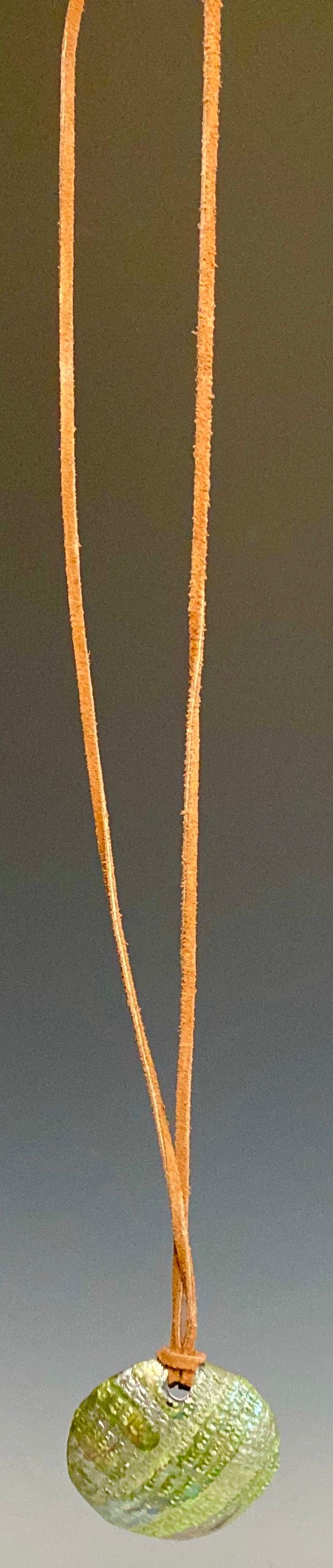 Earthy! 16"  brown suede cord. 1  earthy colored Raku disc Tribal!