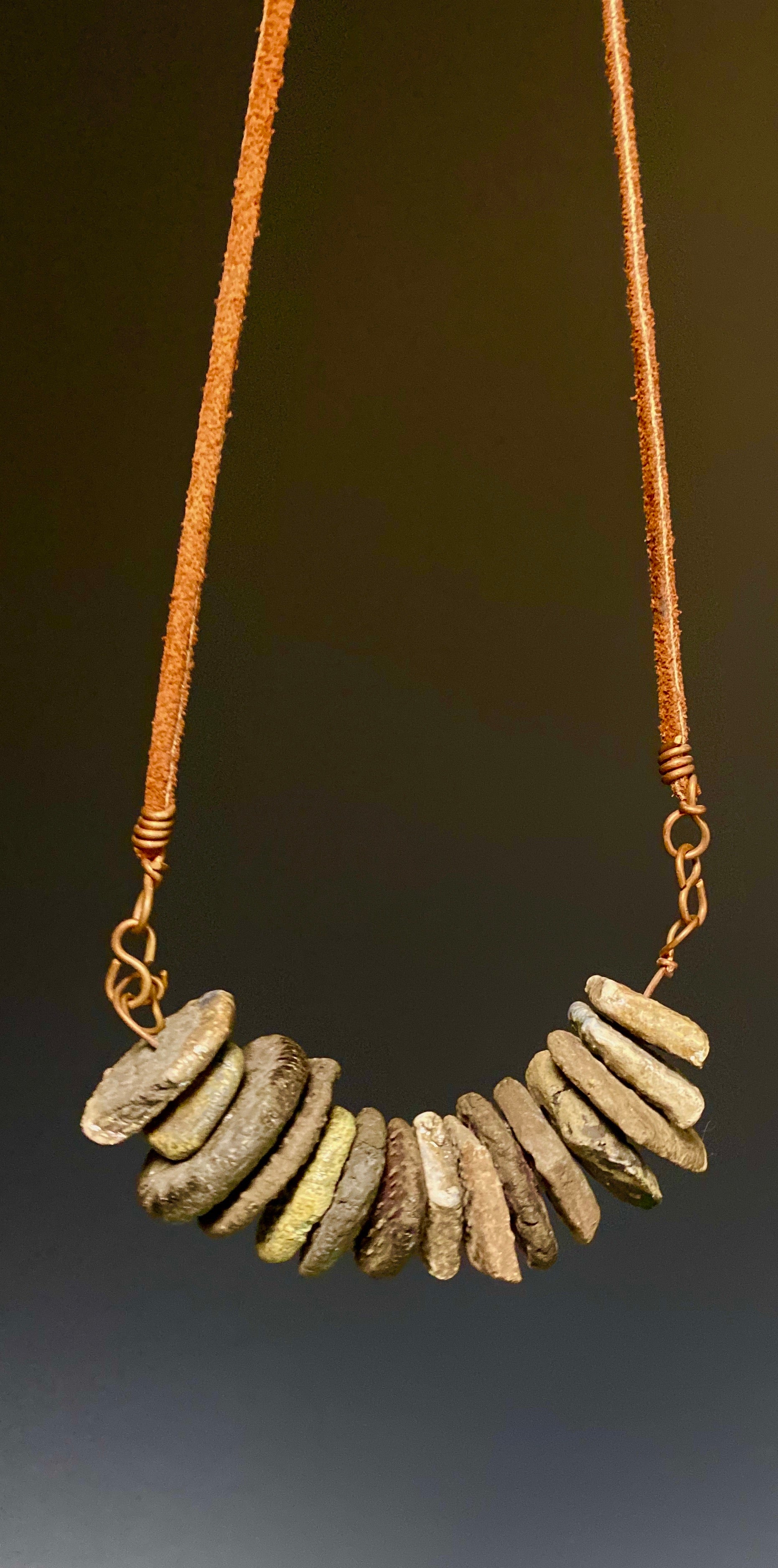 Simple and Beautiful! 9"  drop brown suede cord 15 Raku fired discs 2.3 ozs Nice!