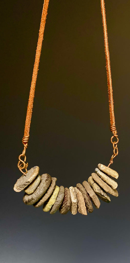 Simple and Beautiful! 9"  drop brown suede cord 15 Raku fired discs 2.3 ozs Nice!