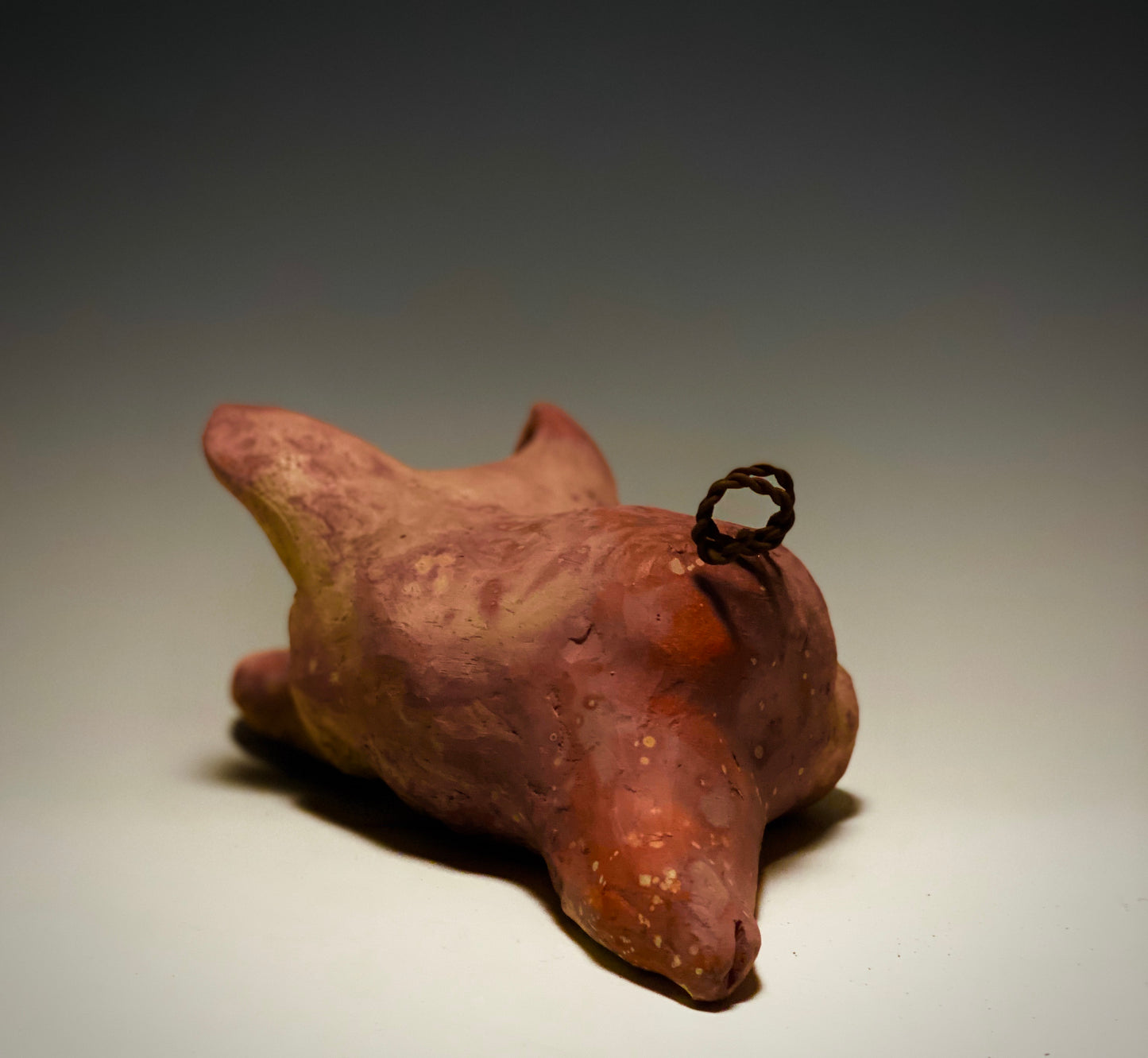 This Little Piggy named Olivia is approx. 4" x 5' x 6" and weighs 1.8 lbs. Olivia has a matte and satin pinkish complexion. Olivia little curly tail is made of wire.