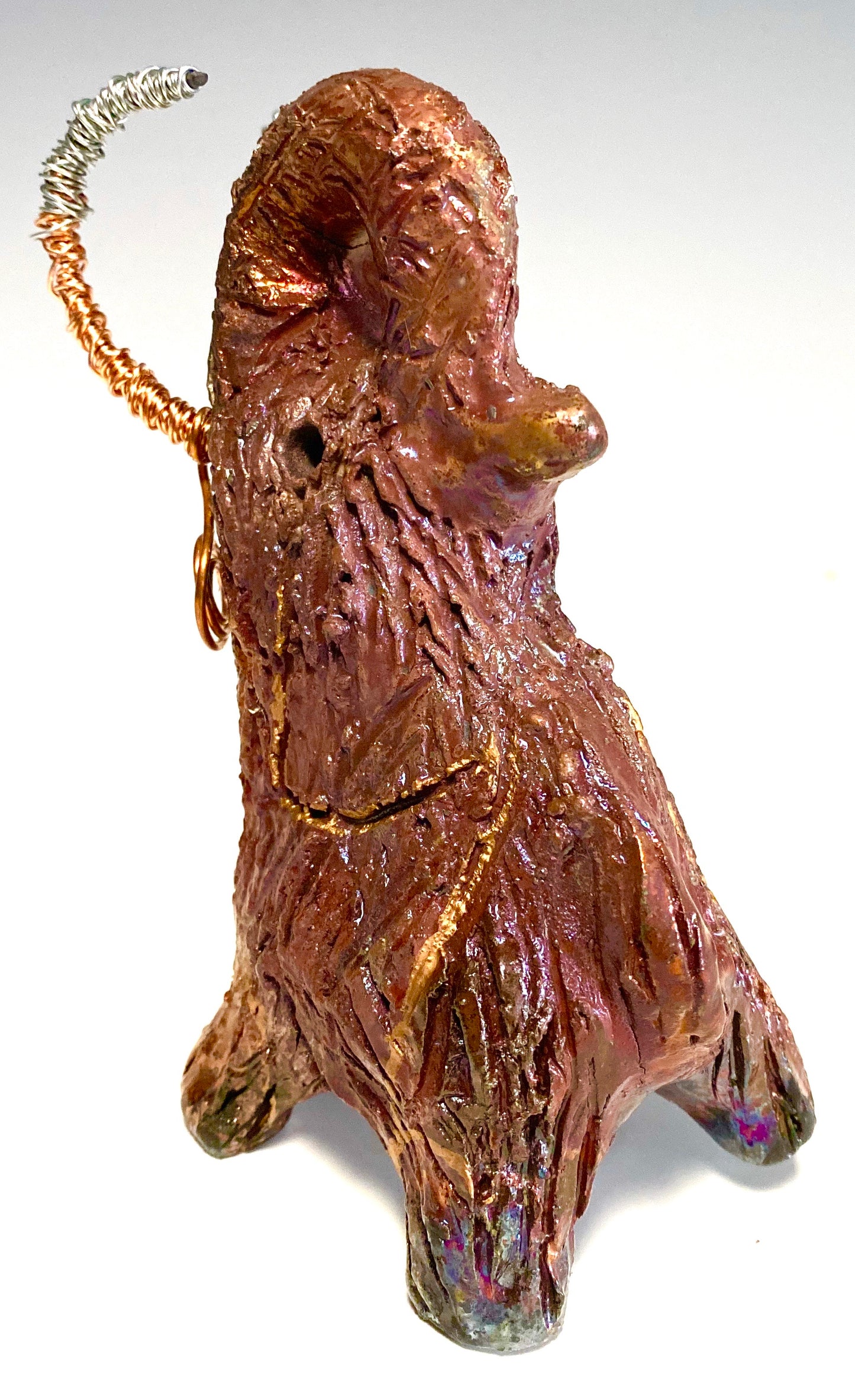 Raku Elephant Have you HERD!!!!!! Just one of these lovely Raku Fired Elephant will make an excellent gift for your friend, sorority or for your home’ special place centerpiece. 6" x 4" x 5" 10 ozs. Beautiful copper metallic raku elephant Copper and silver tusk For decorative purposely only.