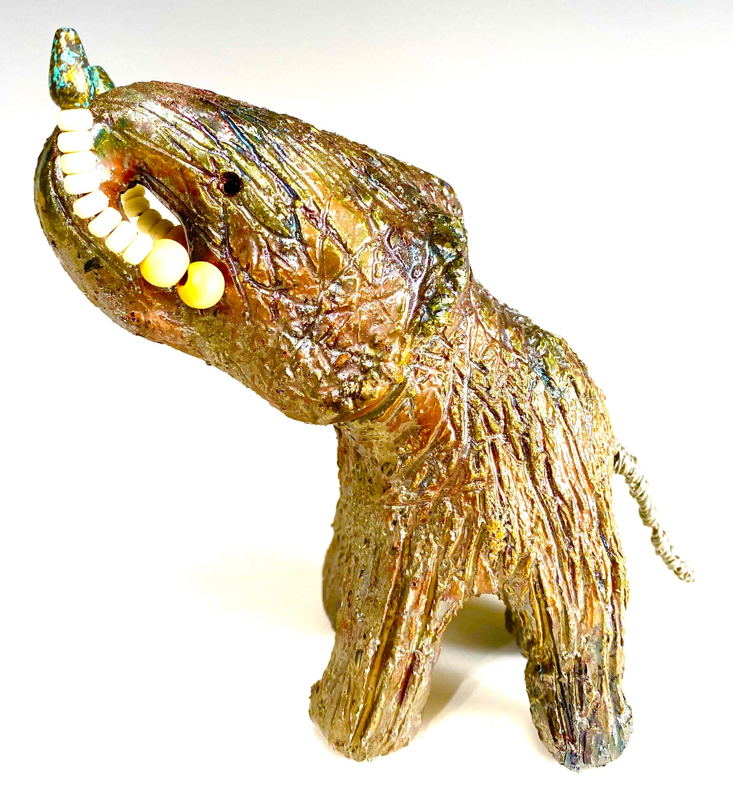 Raku Elephant Have you HERD!!!!!! Just one of these lovely Raku Fired Elephant will make an excellent gift for your friend, sorority or for your home’ special place centerpiece. 6" x 3" x 5" 1 lbs Beautiful metallic raku elephant For decorative purposely only