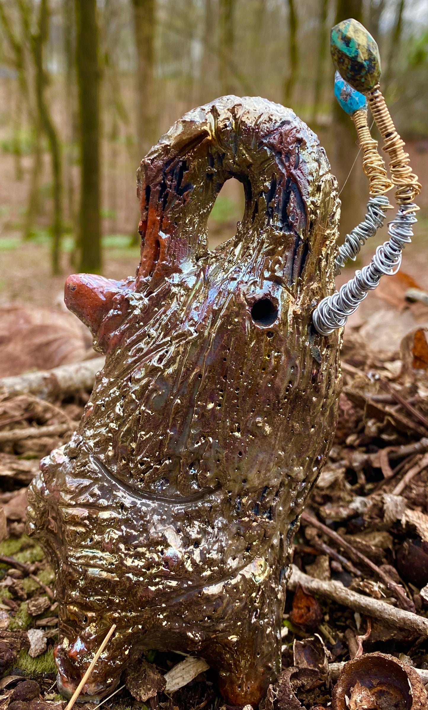 Raku Elephant Have you HERD!!!!!! Just one of these lovely Raku Fired Elephant will make an excellent gift for your friend, sorority or for your home’ special place centerpiece. 6.5" x 3" x 4" 10 ozs Silver and gold beaded tusk Beautiful gold metallic raku elephant For decorative purposely only