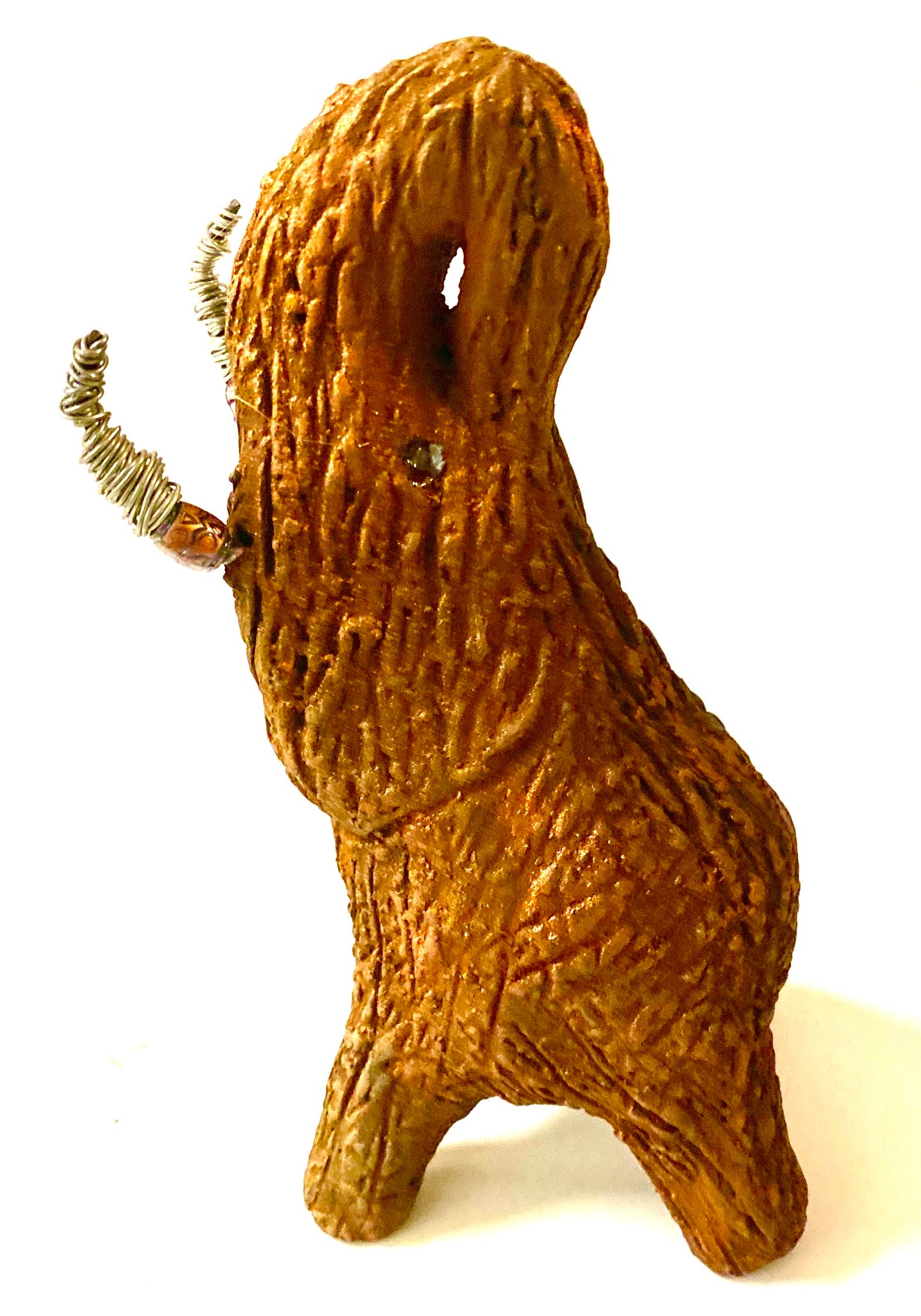 Raku Elephant Have you HERD!!!!!! Just one of these lovely Raku Fired Elephant will make an excellent gift for your friend, sorority or for your home’ special place centerpiece. 6" x 3" x 4" 10.9 ozs. Beautiful metallic and red rust raku elephant For decorative purposely only