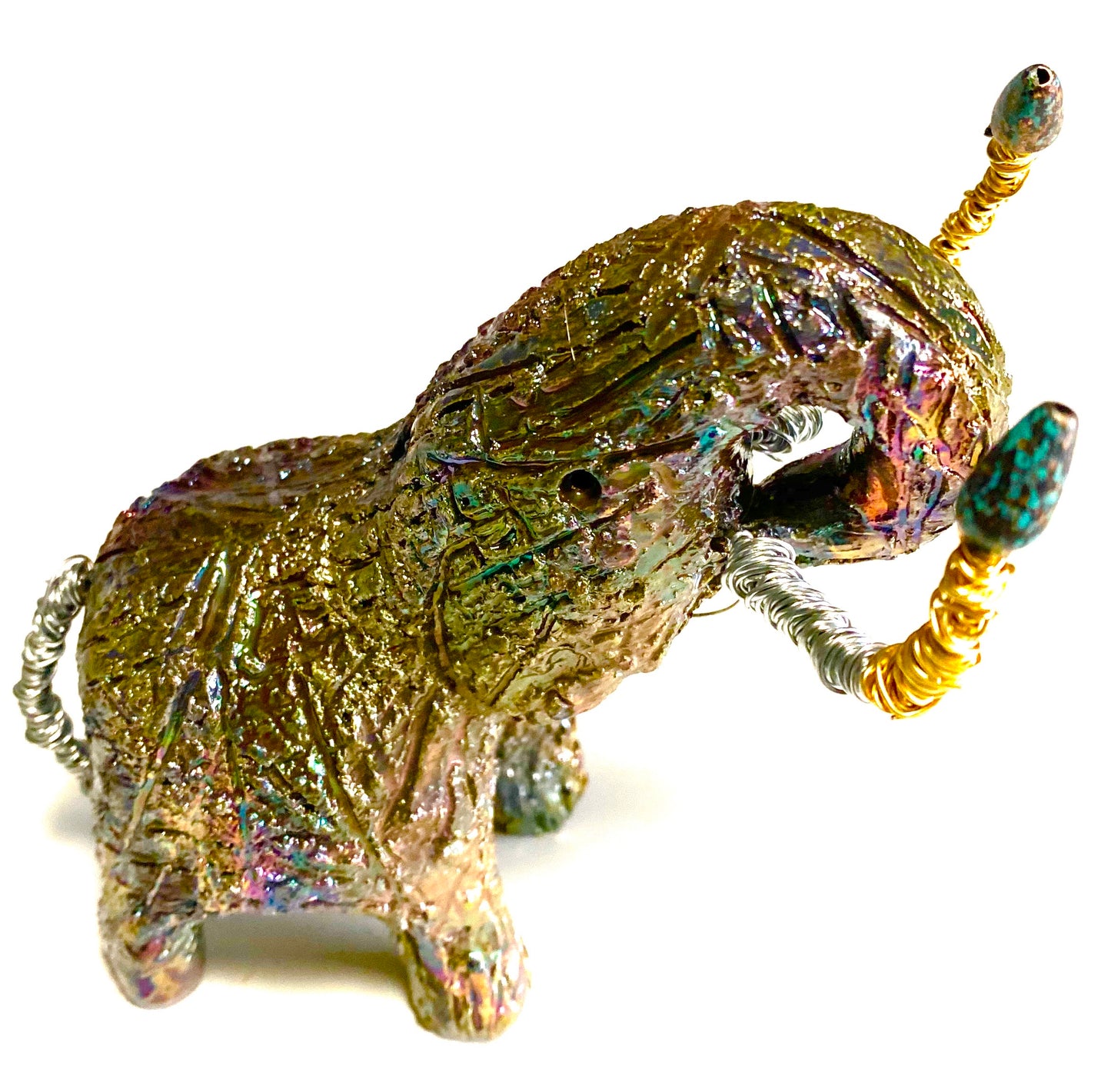 Raku Elephant Have you HERD!!!!!! Just one of these lovely Raku Fired Elephant will make an excellent gift for your friend, sorority or for your home’ special place centerpiece. 5" x 4" x 5" 10 ozs. Beautiful copper metallic raku elephant Copper and silver beaded tusk For decorative purposely only.